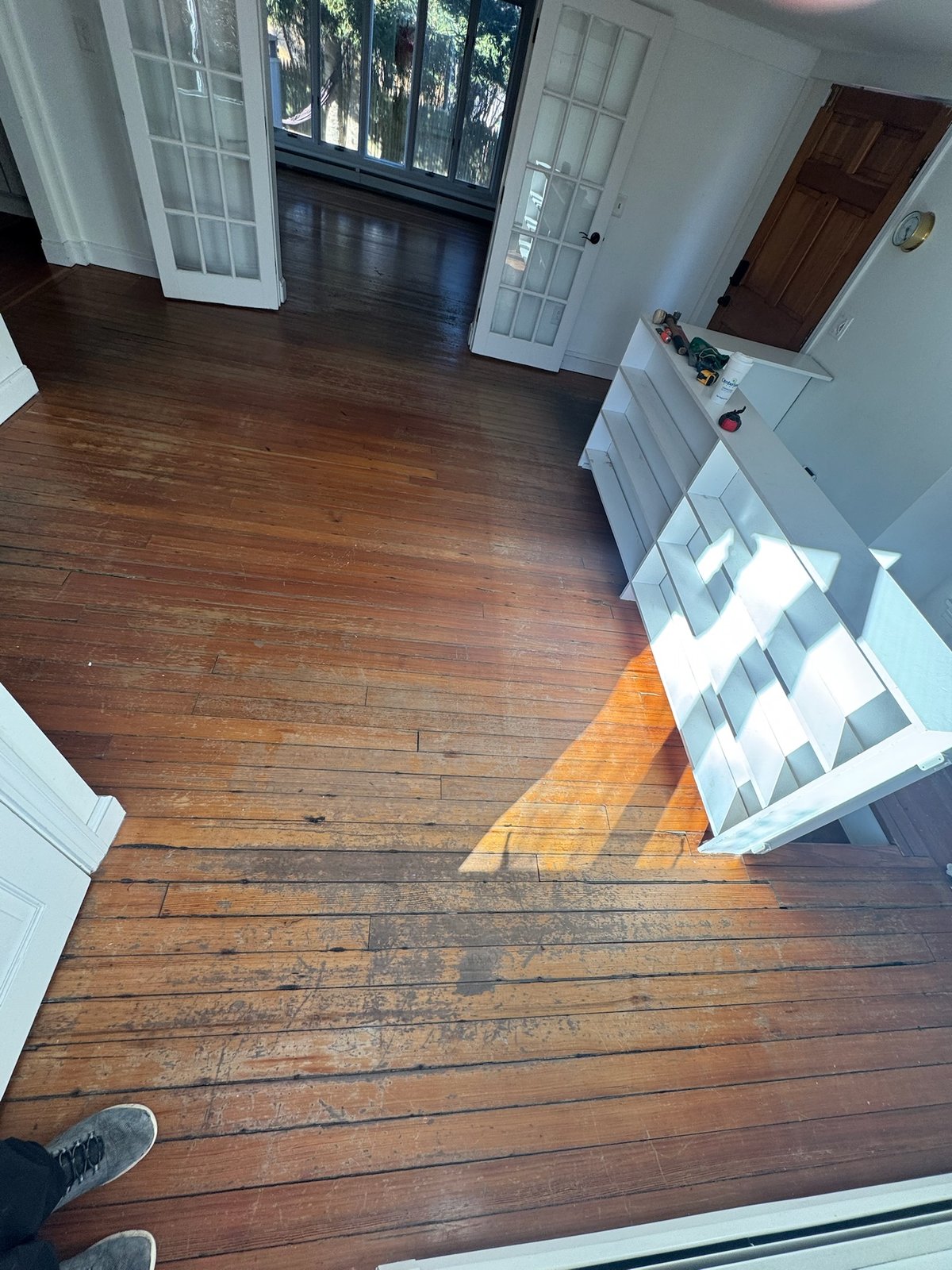 Middletown RI — existing worn hardwood floor before selective replacement and restoration