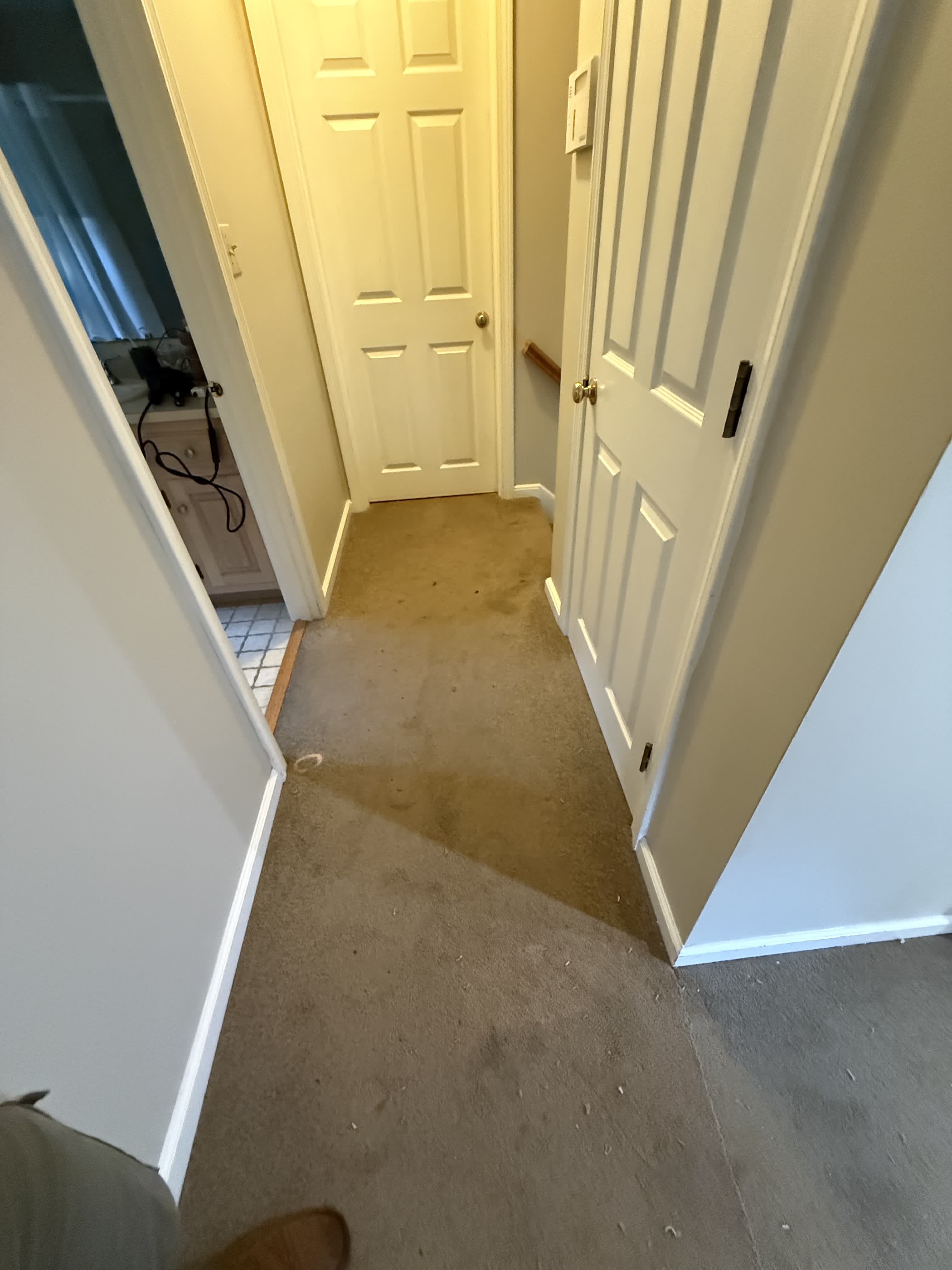 Wrentham MA — hallway with original carpet before hardwood installation