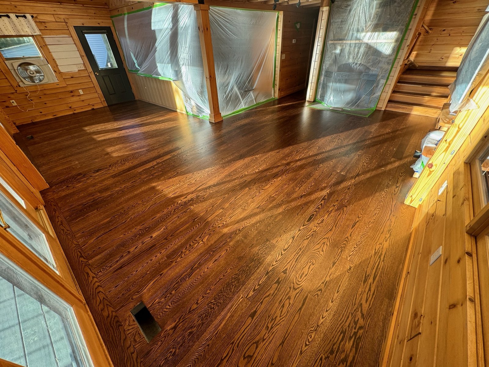 Killingly CT — finished dark stained hardwood floor with staircase, alternate hero angle