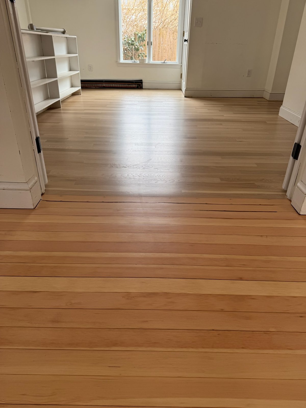 Middletown RI — integration transition from old heart pine to new white oak after sanding
