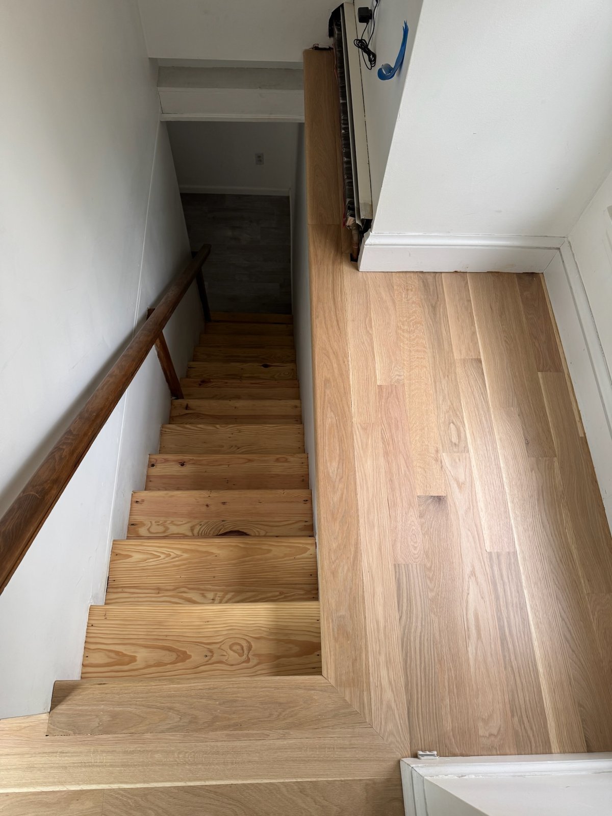 Middletown RI — staircase and landing included in the whole-house sand and refinish scope