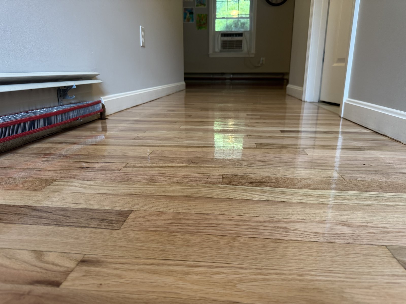 Coventry RI — finished natural hardwood floor with LOBA 2K Duo satin finish after prefinished restoration