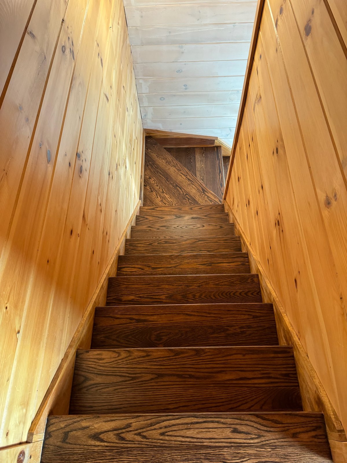 Killingly CT — finished dark stained staircase after water-popping, staining, and LOBA finish