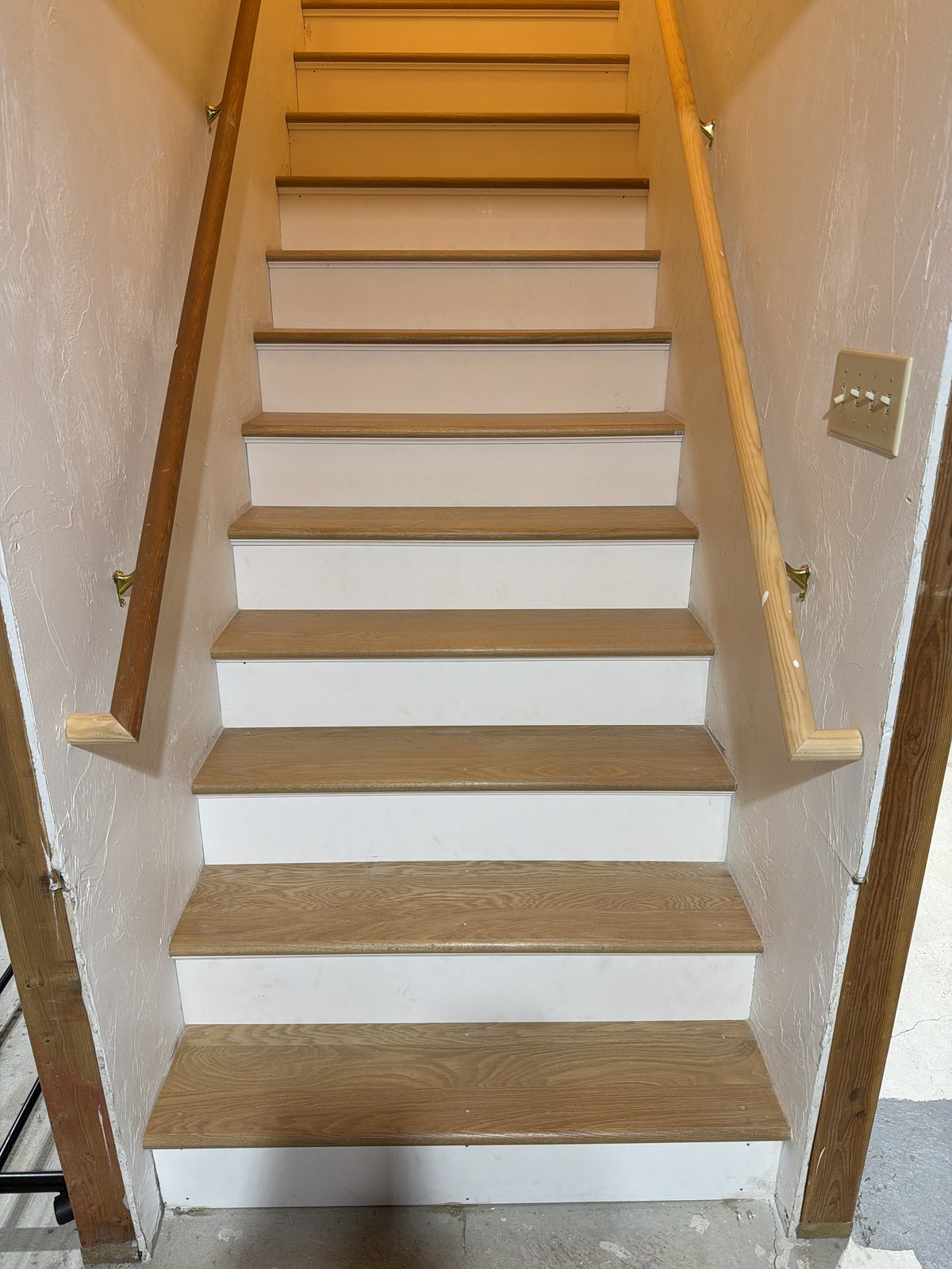 Cranston RI — finished white oak staircase, alternate angle showing treads, risers, and handrail