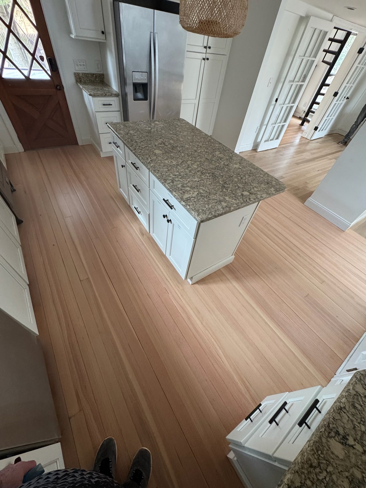 Middletown RI — finished kitchen with new white oak integrated into the preserved heart pine floor