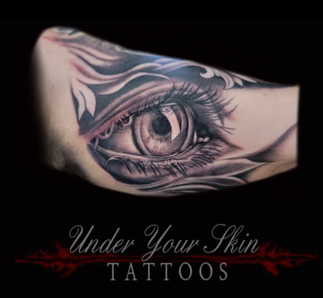 Realism eye tattoo by Under Your Skin Tattoos