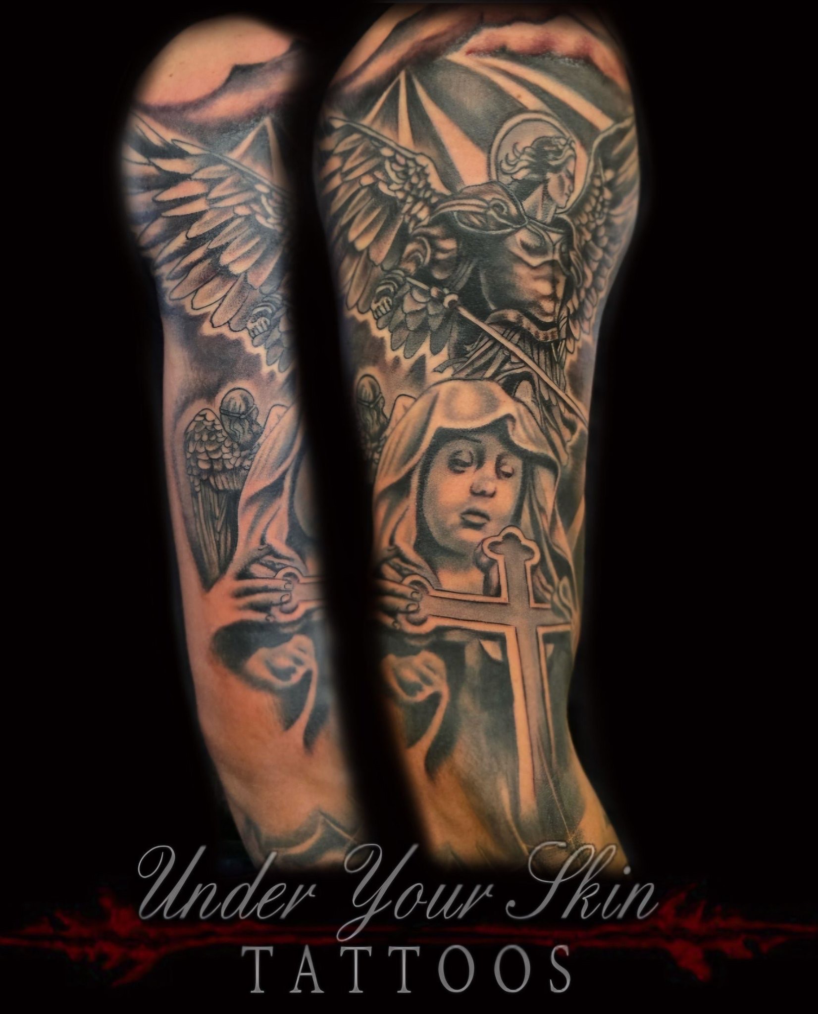 Religious angel sleeve tattoo by Under Your Skin Tattoos