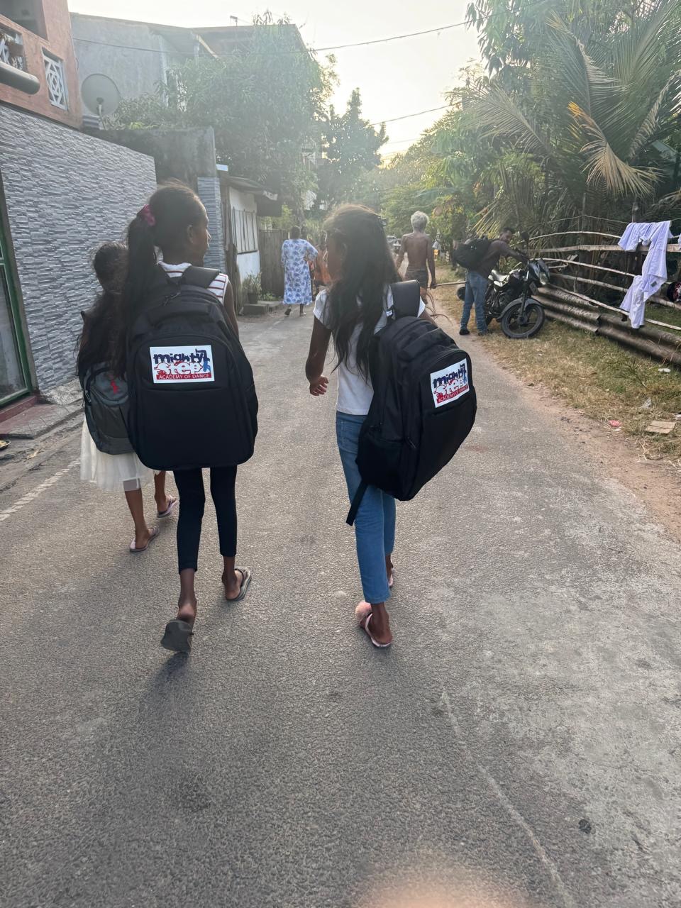 Students walking with Mighty Step Academy backpacks in Sri Lanka