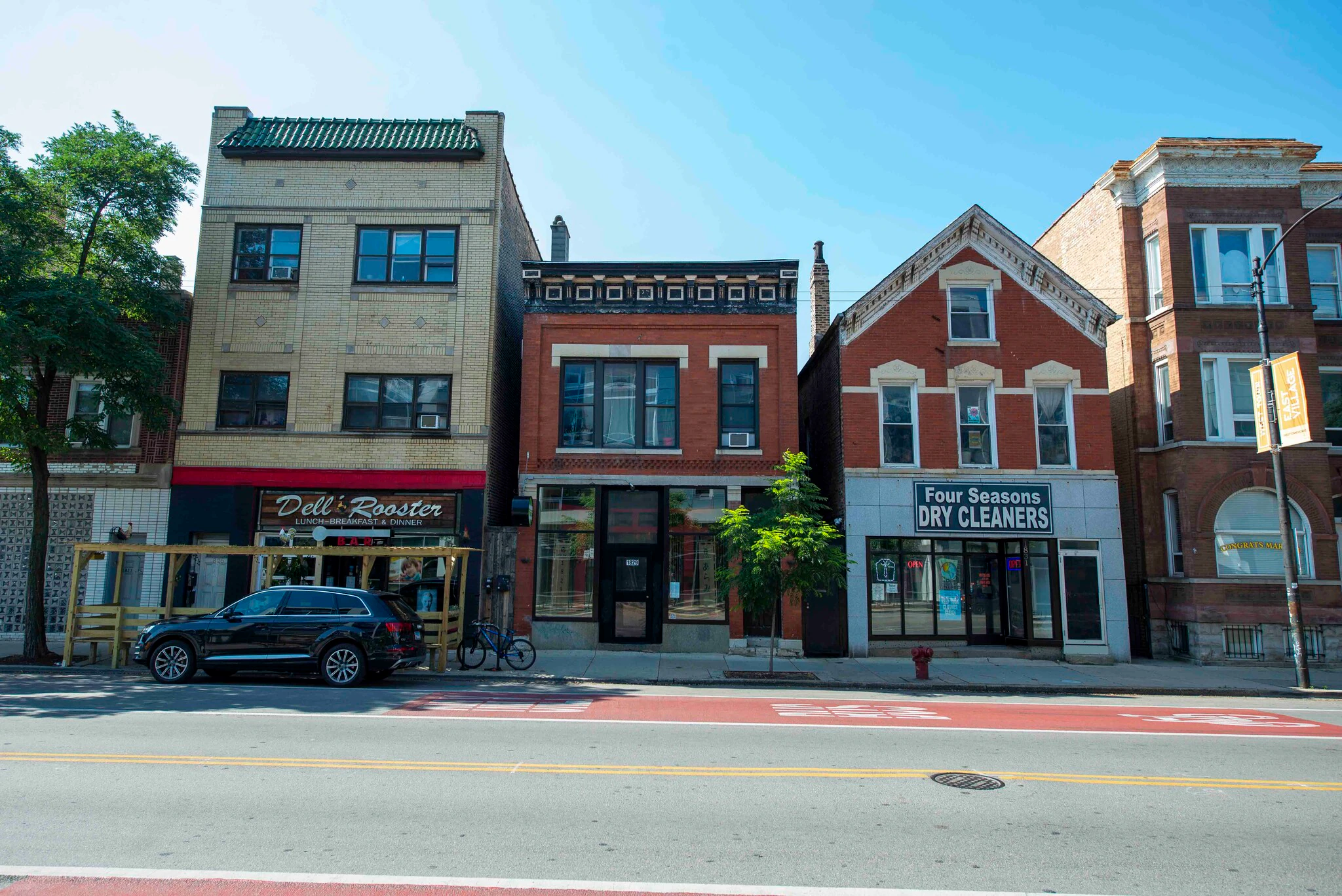 Chicago Avenue streetscape showing 1829 W Chicago Ave and neighboring businesses