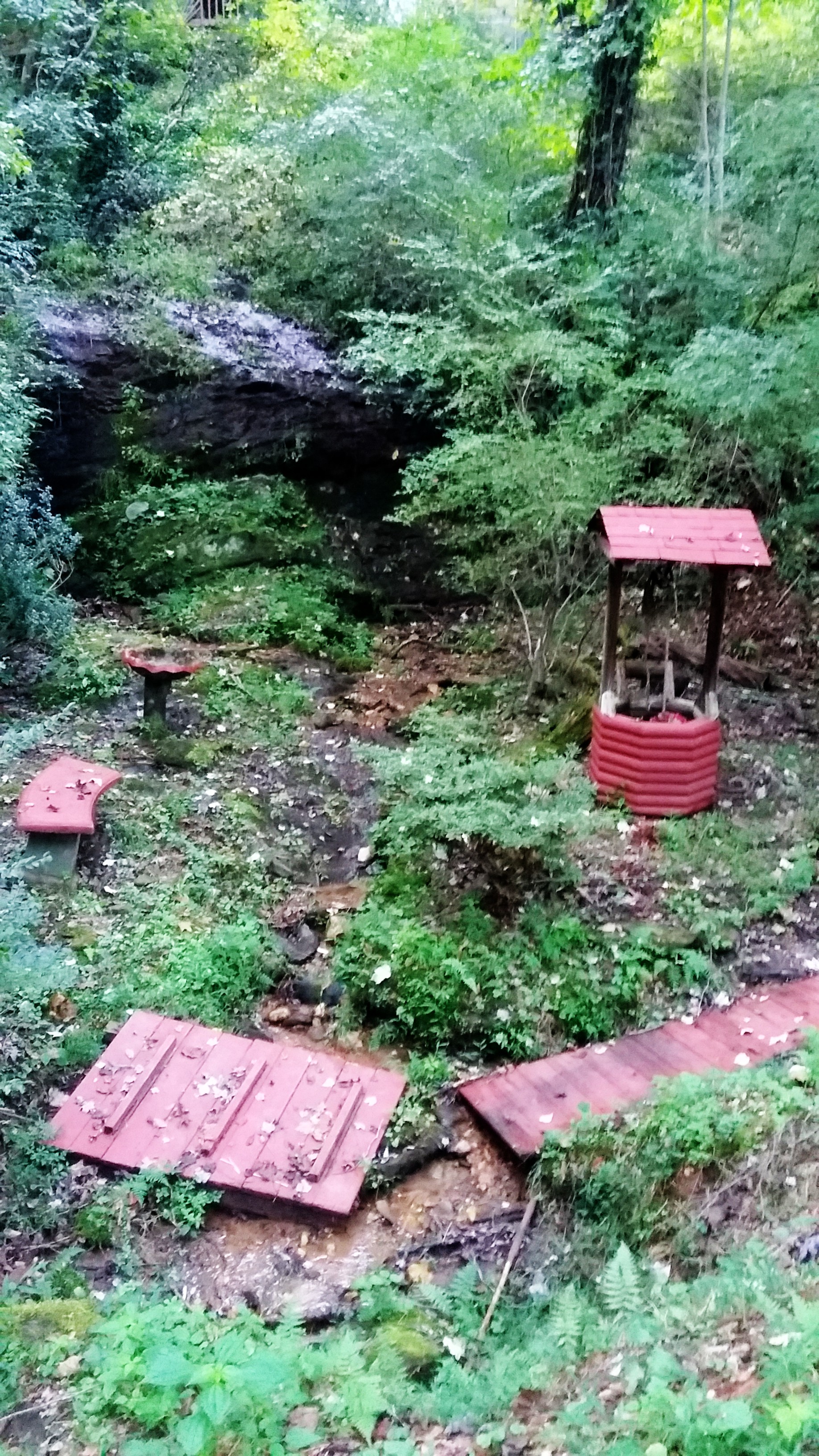 Scenic trail and wishing well on the Bear Creek property