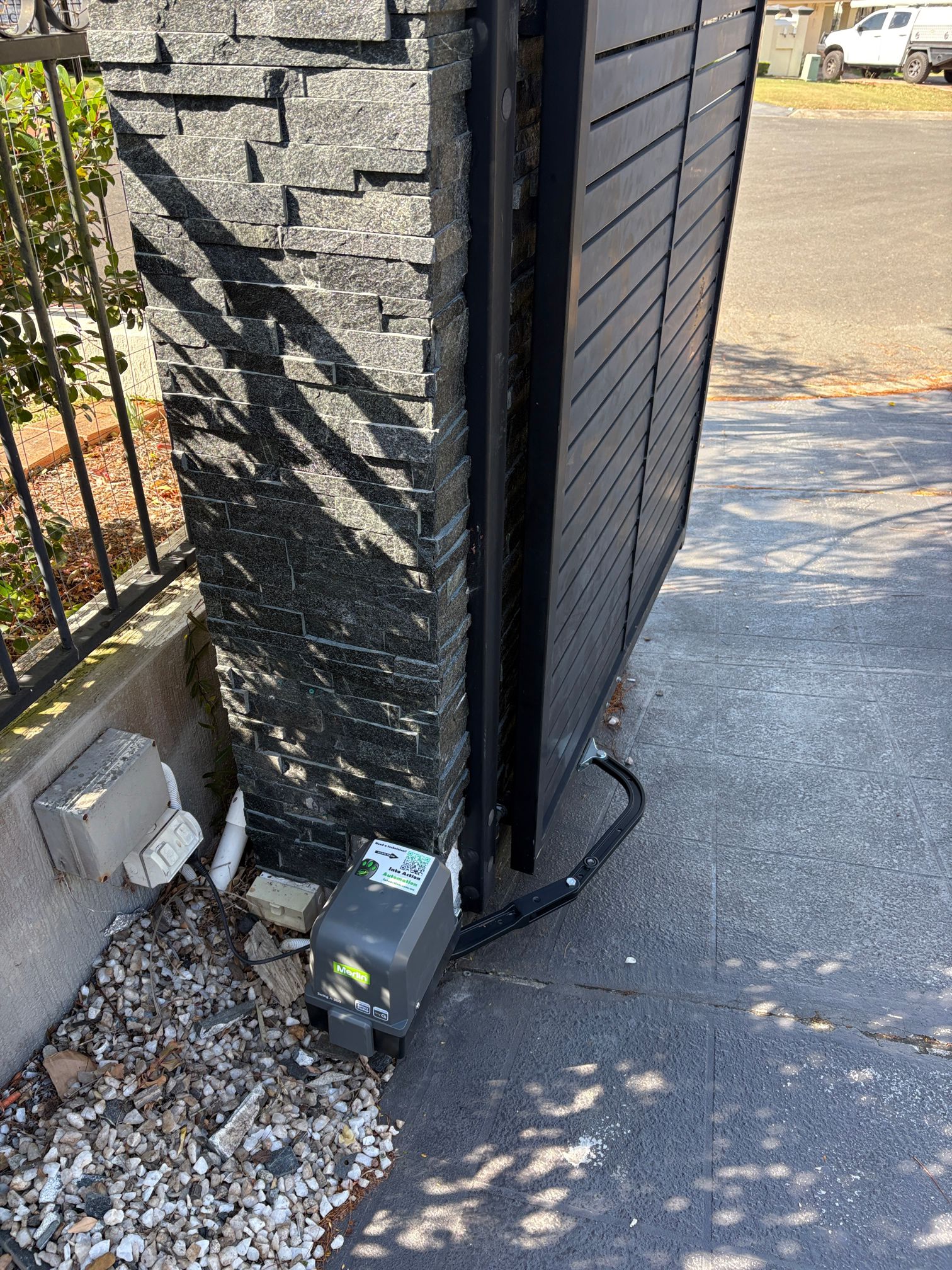 Merlin A200 out-swing gate motor installed on a residential property in Brisbane