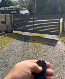 Ditec swing gate repair completed in Forestdale — testing with remote