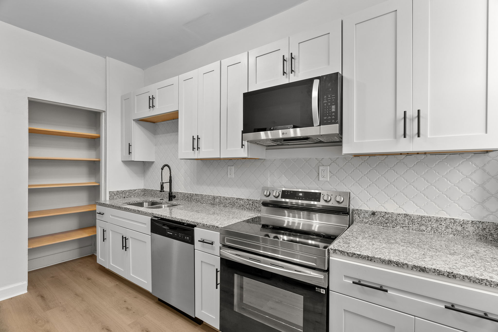 Before and after kitchen renovation with new flooring and updated fixtures