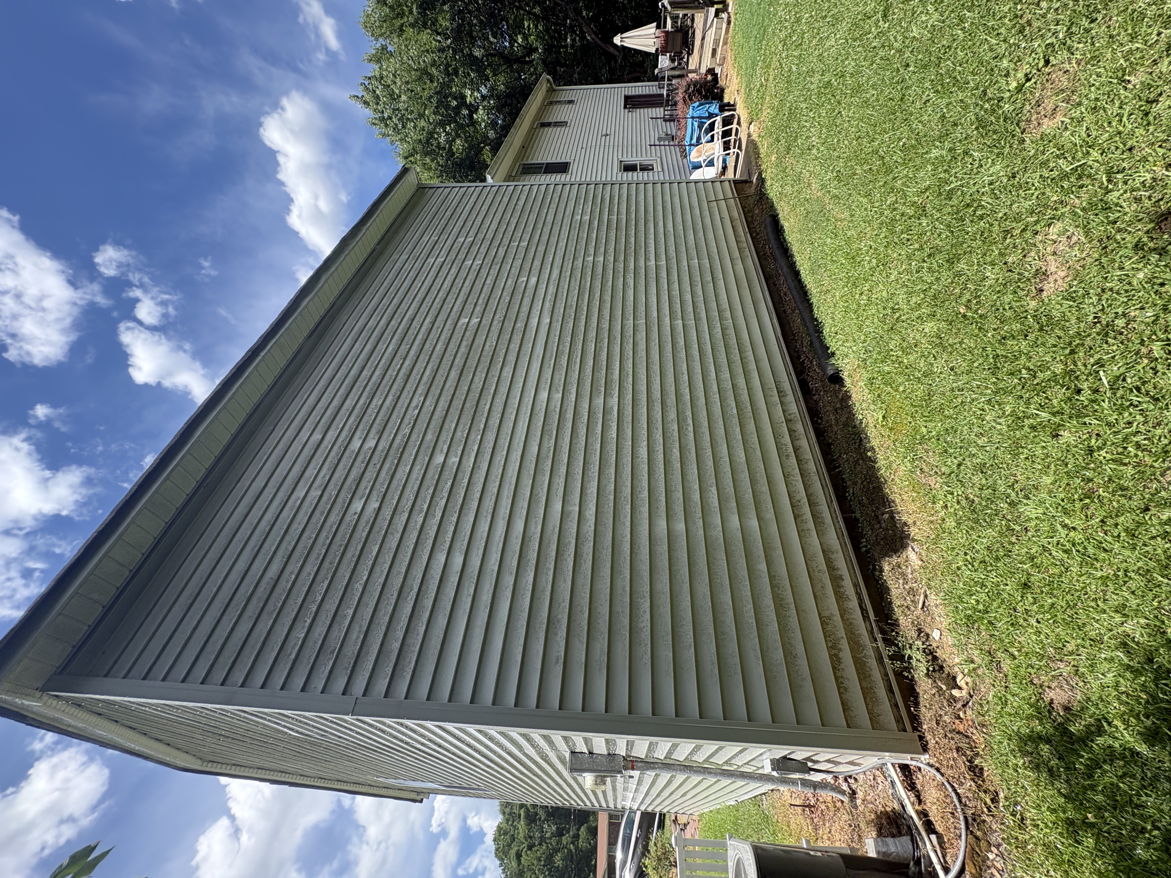 Dirty house siding with algae and grime before exterior soft wash by Washing Limitless Rock Hill SC