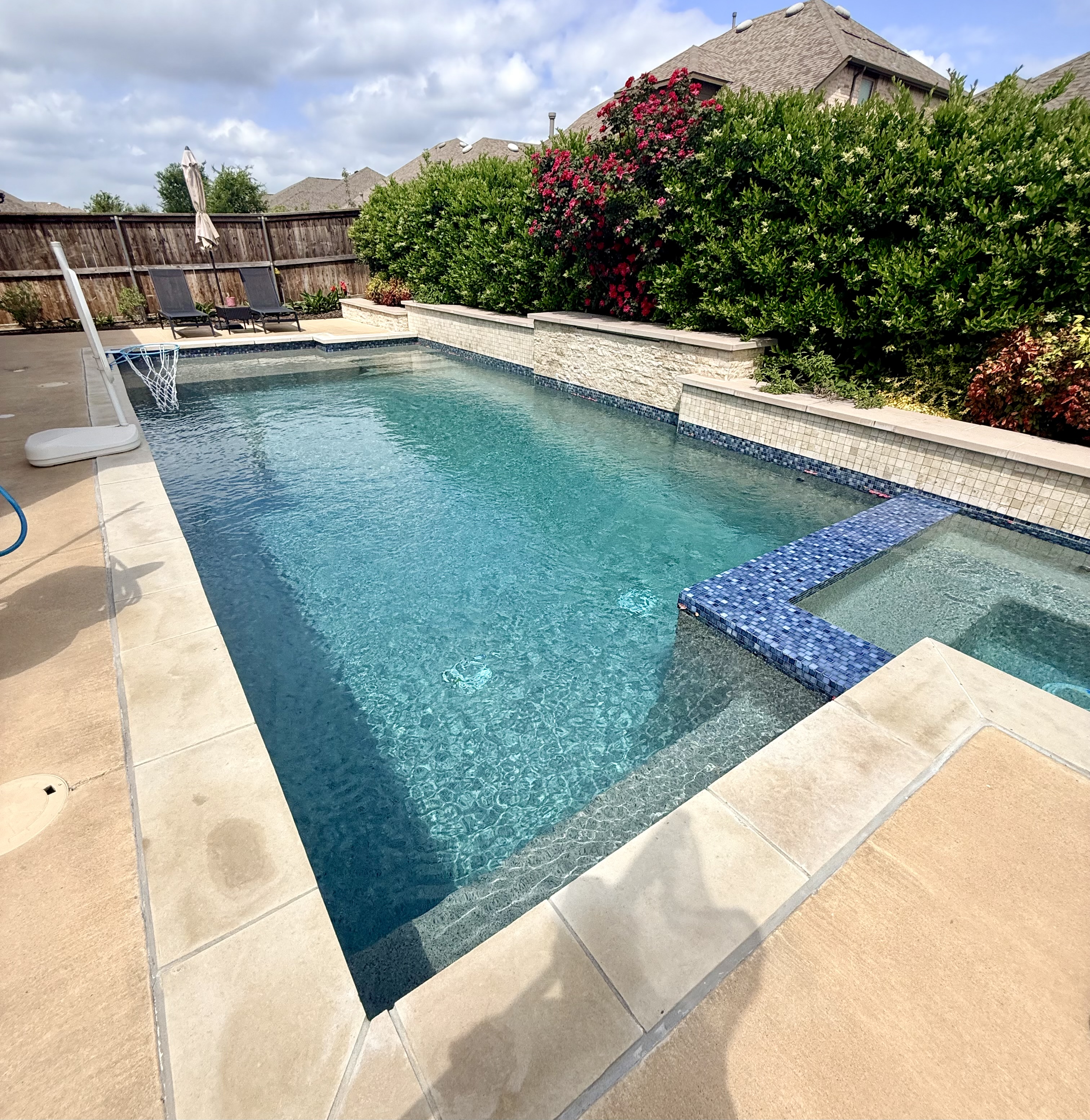 Rectangular pool with spa and blue tile — Celina TX