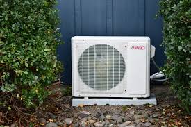 Lennox mini-split ductless heat pump system installed outside a home