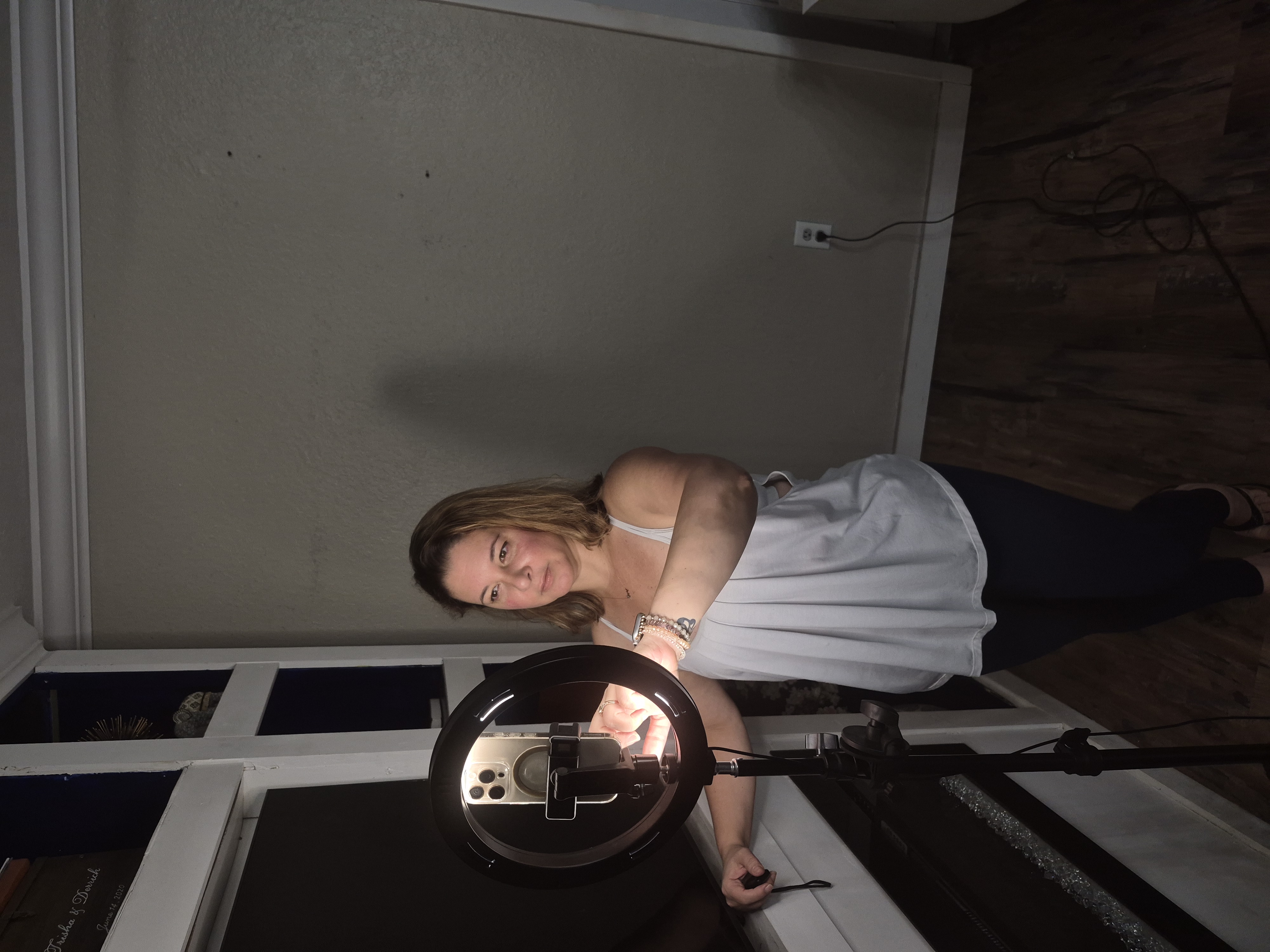 Trish standing with a ring light β yeah, this is what content creation actually looks like