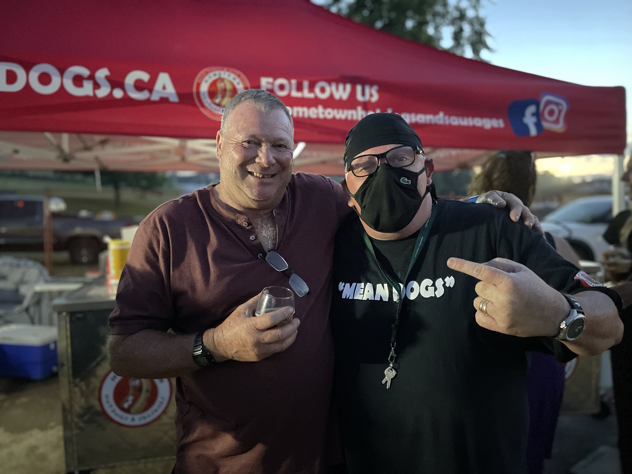 Fan with Christian showing off Mean Dogs shirt
