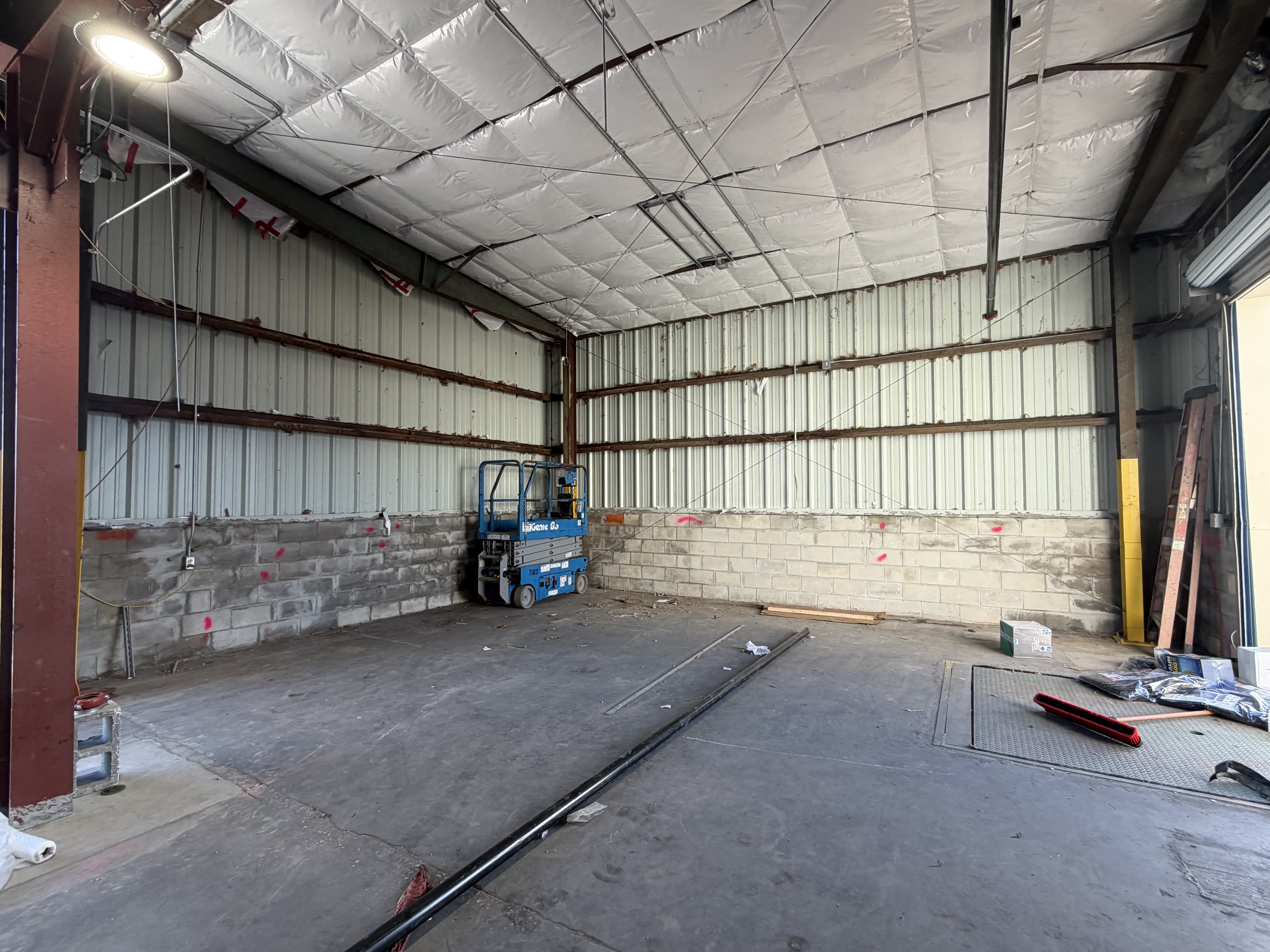 Lockheed Martin facility — structural steel and interior ready for surface prep