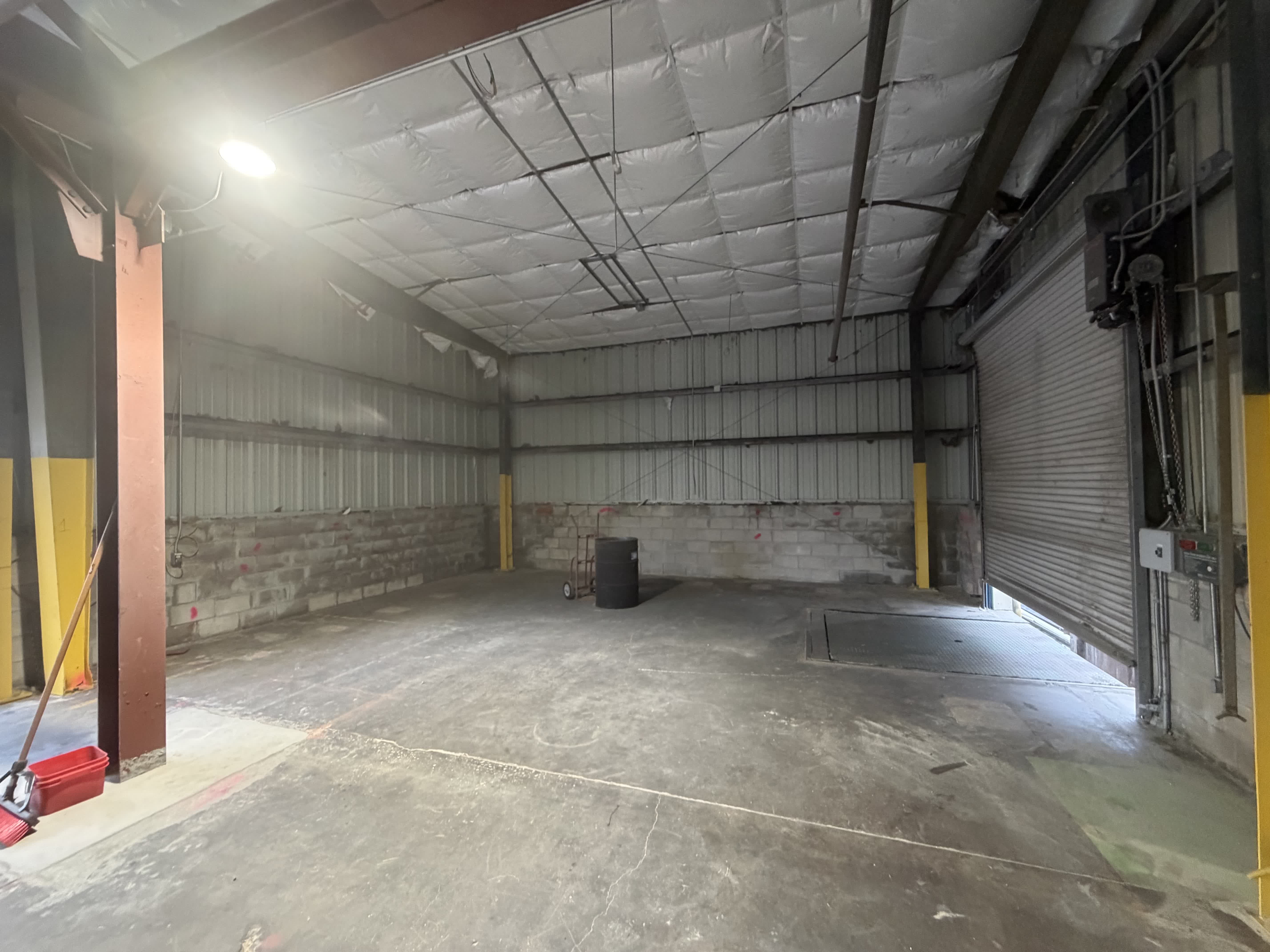 Lockheed Martin warehouse conversion — interior surface preparation scope