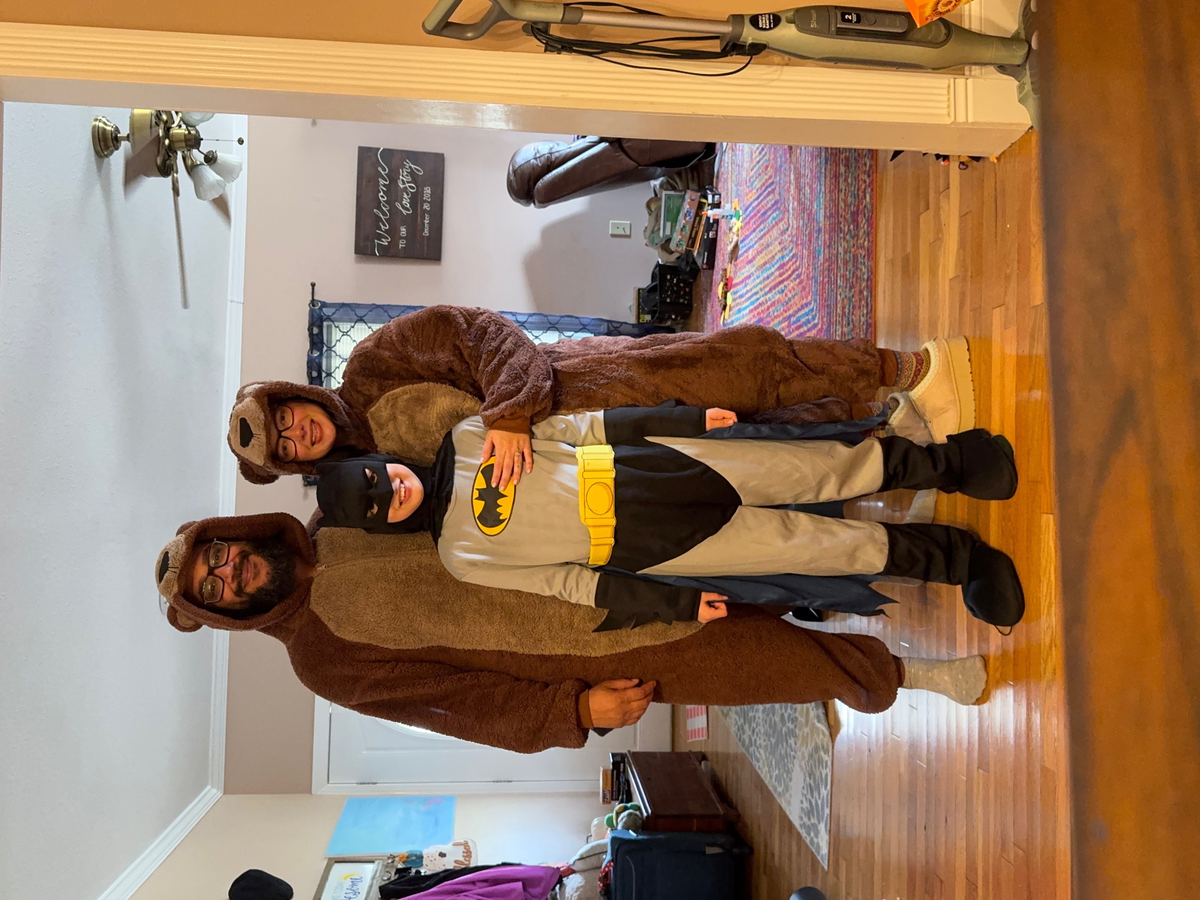 The Cortes family on Halloween — bears and Batman