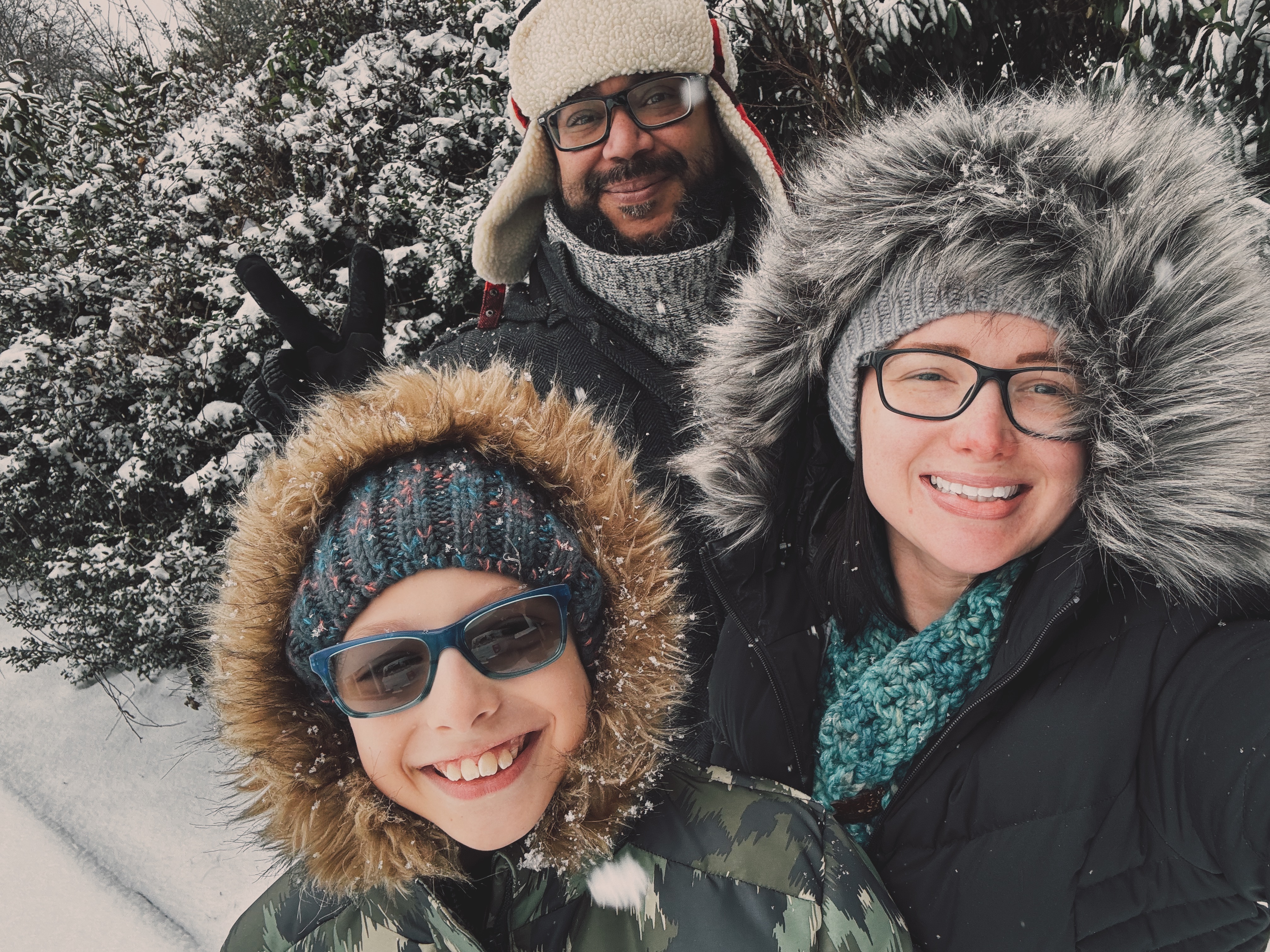 The Cortes family enjoying a snow day together
