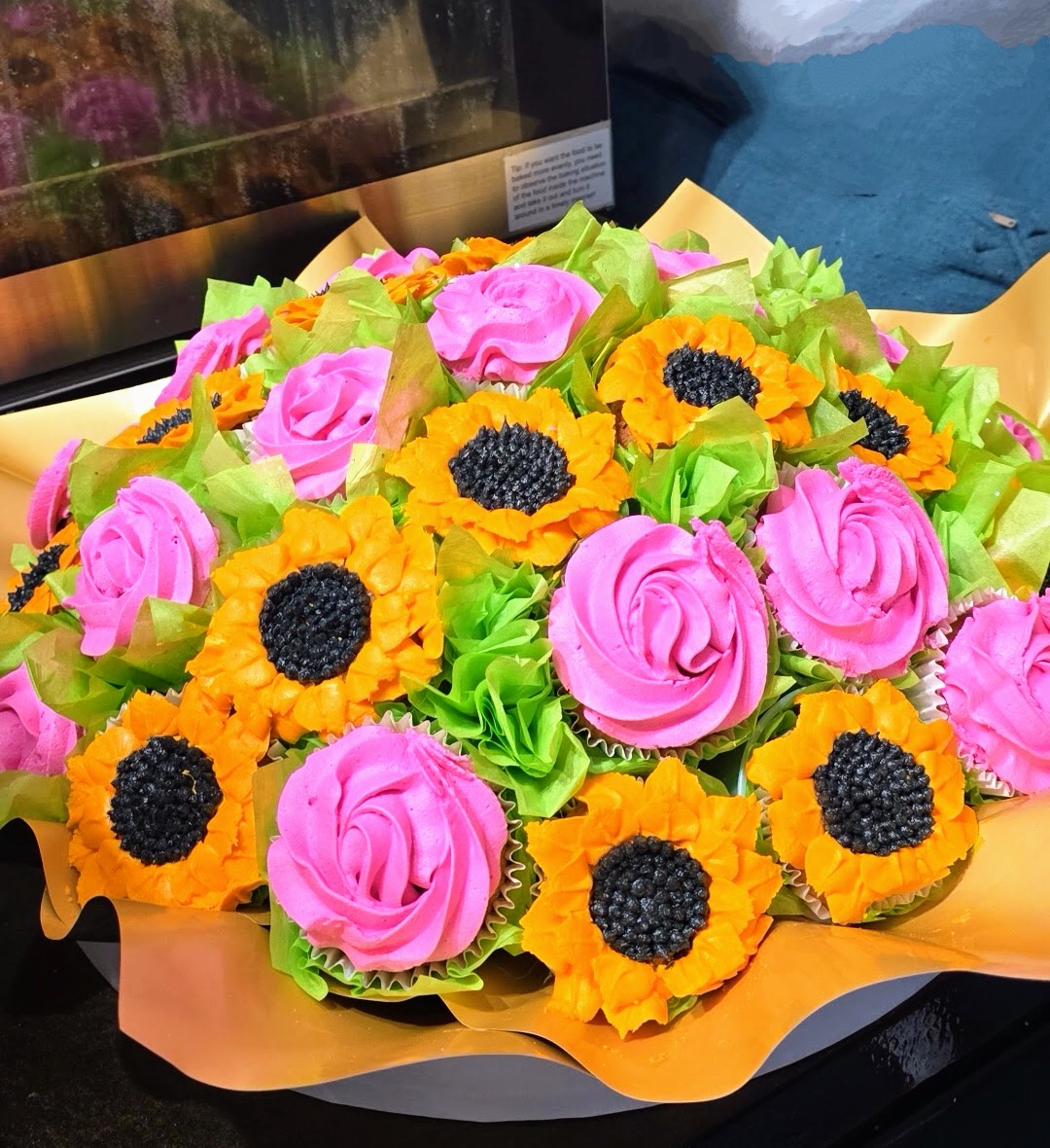Pink roses and sunflower cupcake bouquet