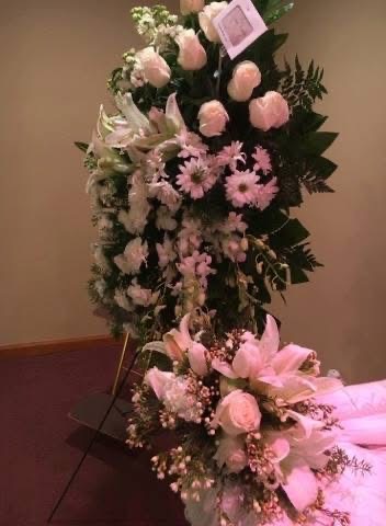 Pink roses and daisies cascading spray