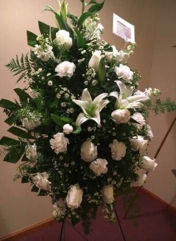 All white standing spray with lilies