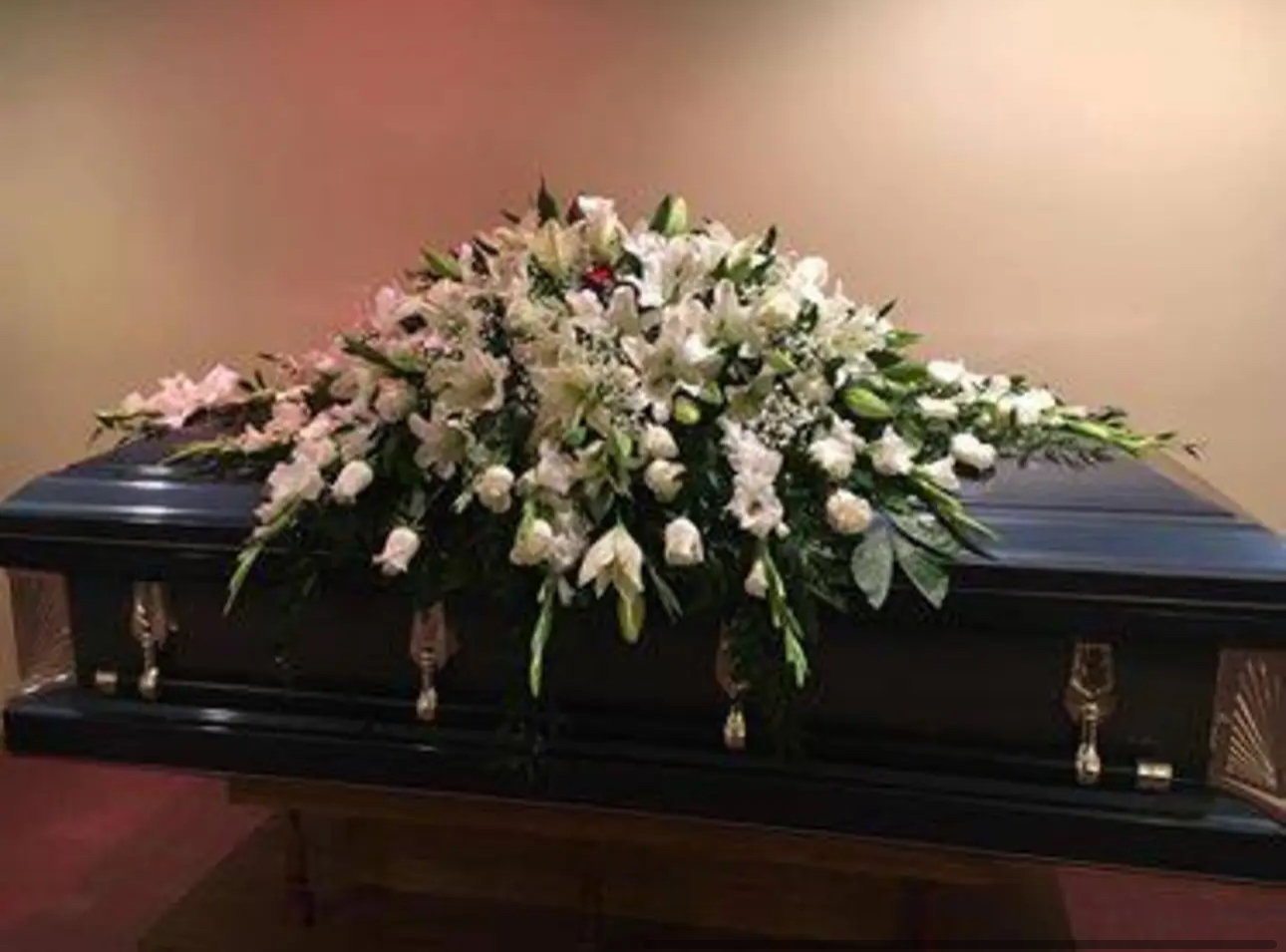 White lily casket spray