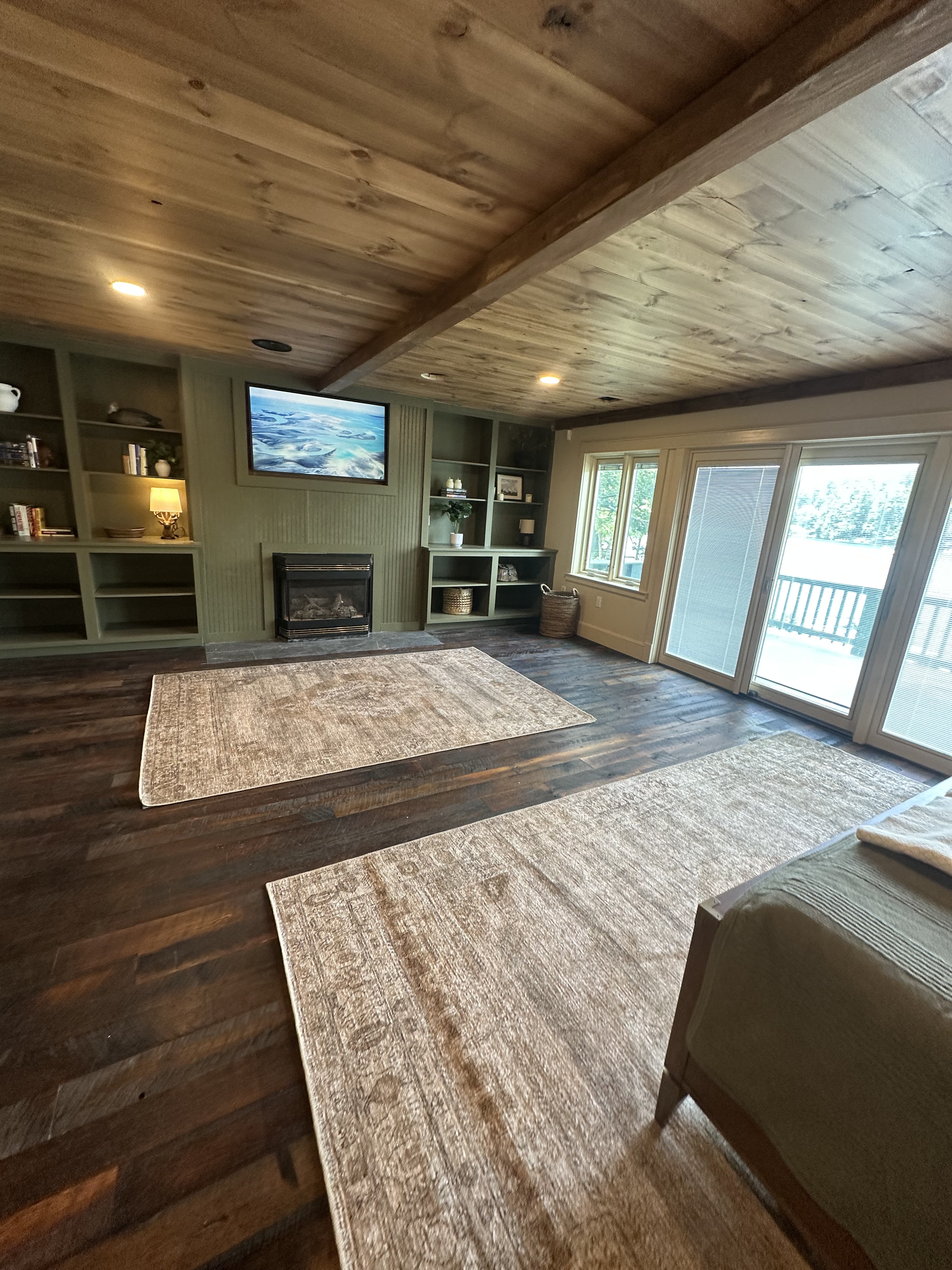 Living room with hardwood & built-ins