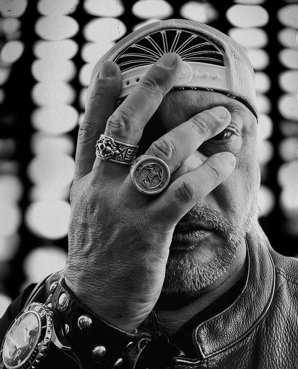 Real wear. Custom rings, scorpion signet, Vantage on the wrist. Loyalty lives in the details.