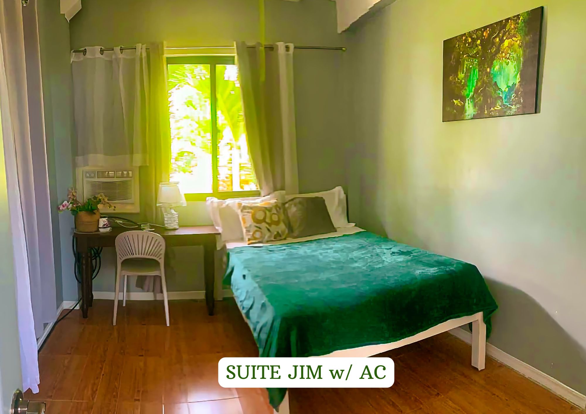 Suite Jim w/ AC — cozy single bed room at The Oasis Resort near Naga City