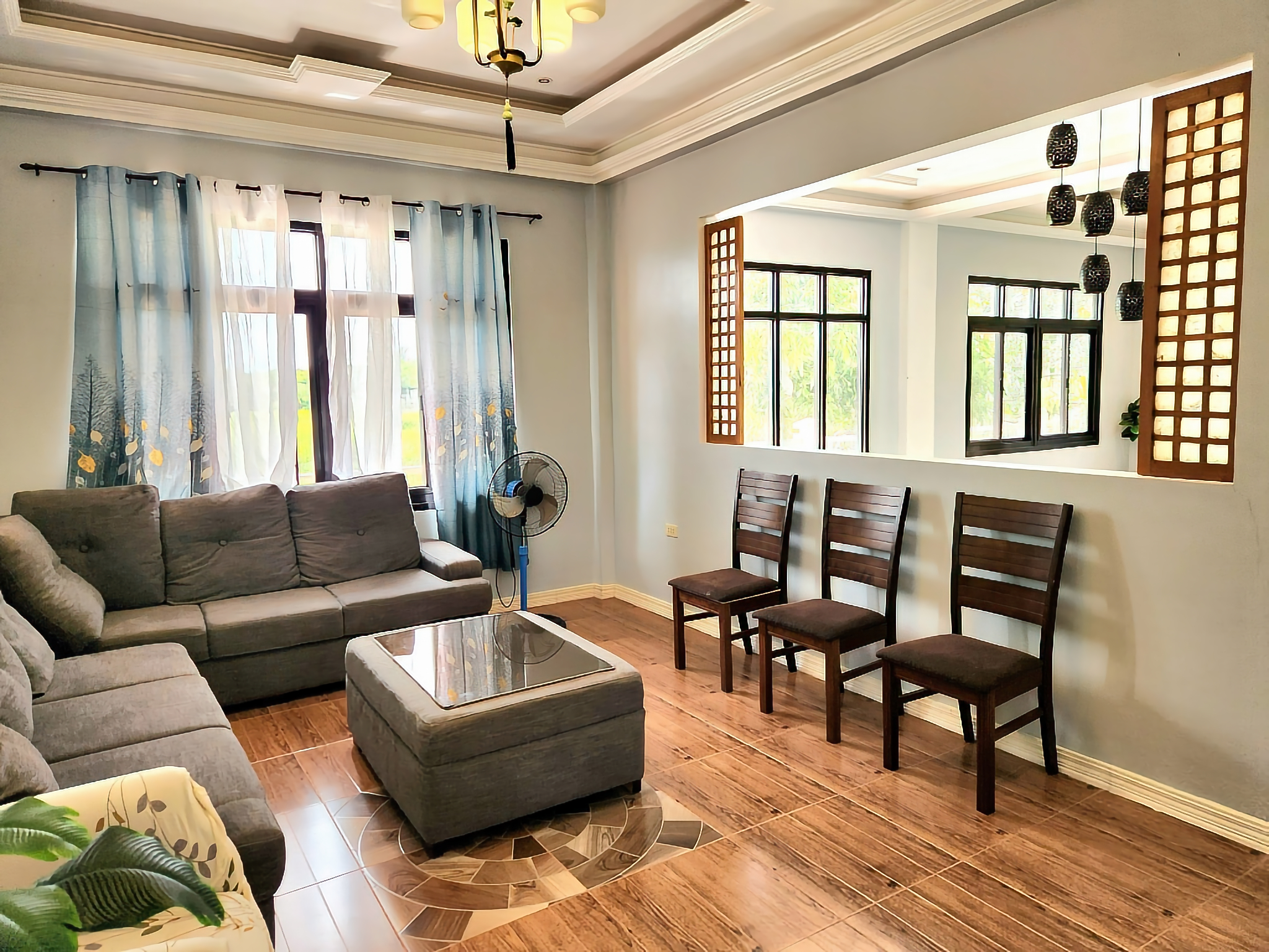 Cozy air-conditioned living area at The Oasis Resort near Naga City