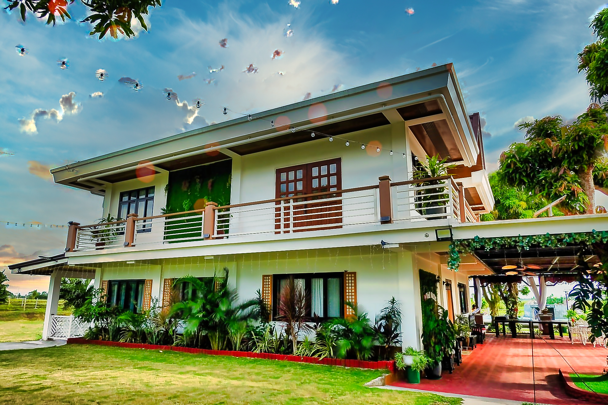 The Oasis Resort & Venue exterior building with lush garden in San Fernando, Camarines Sur
