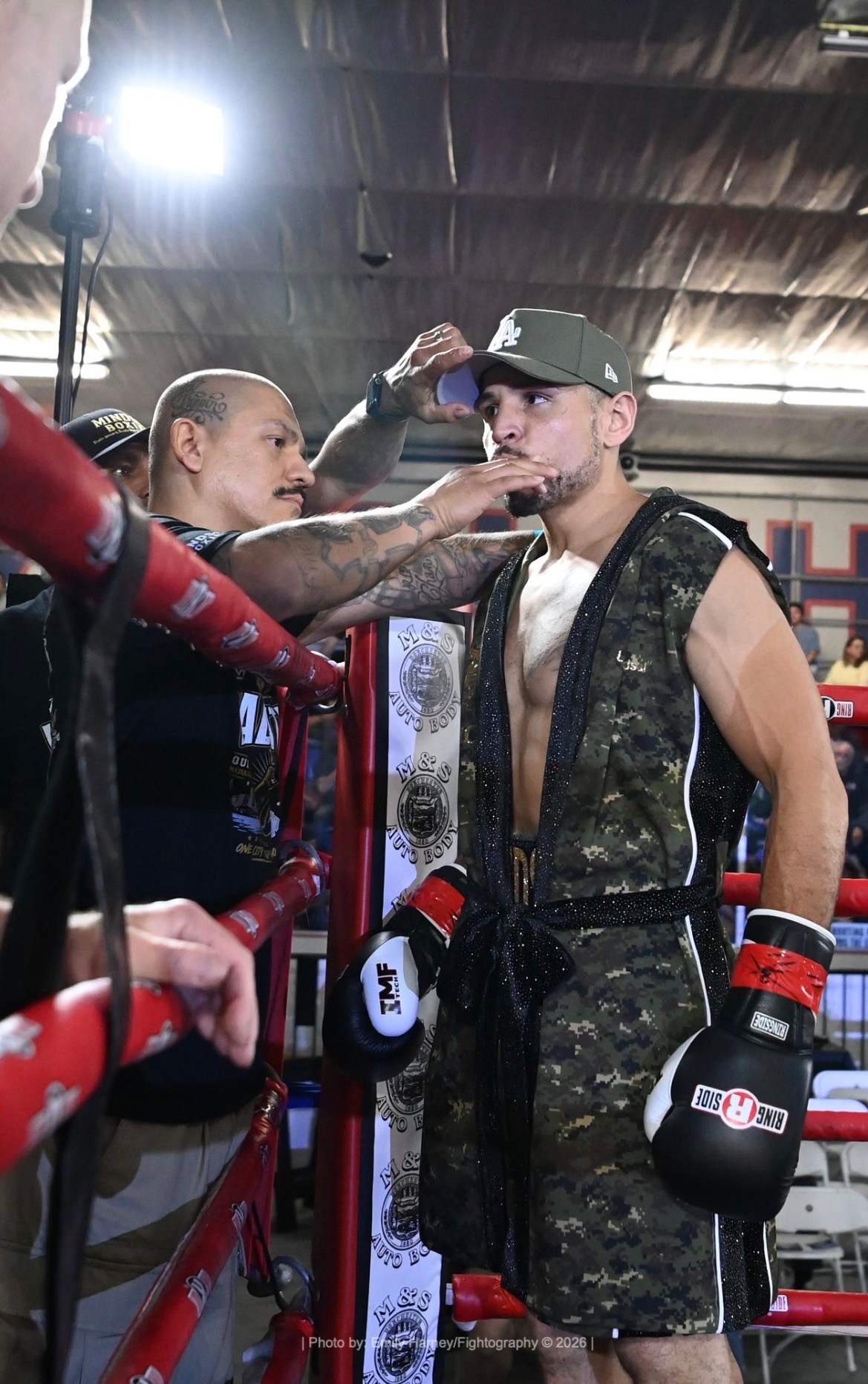 Coach giving instructions ringside