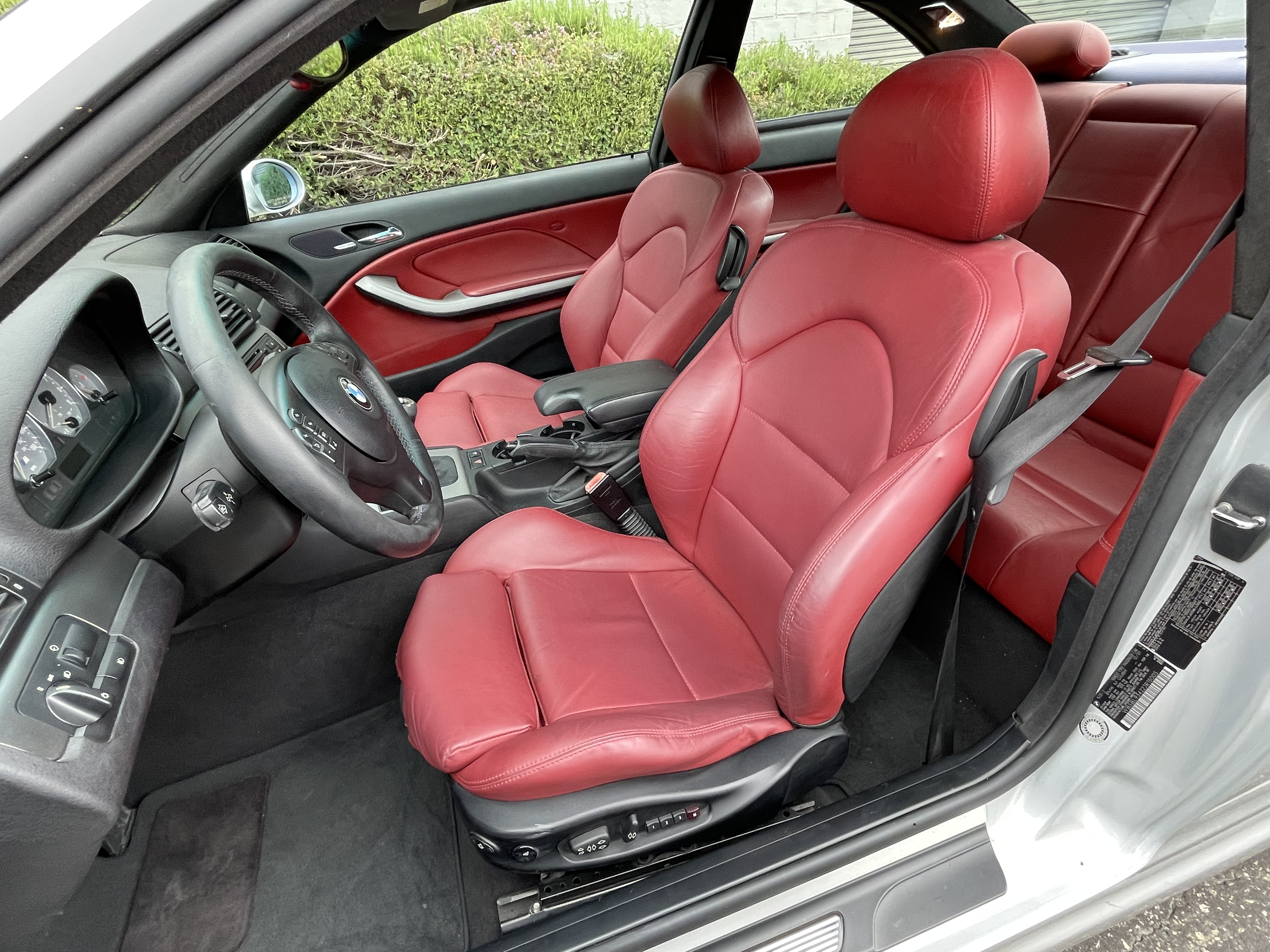 BMW M3 full interior detail - driver side red leather seats