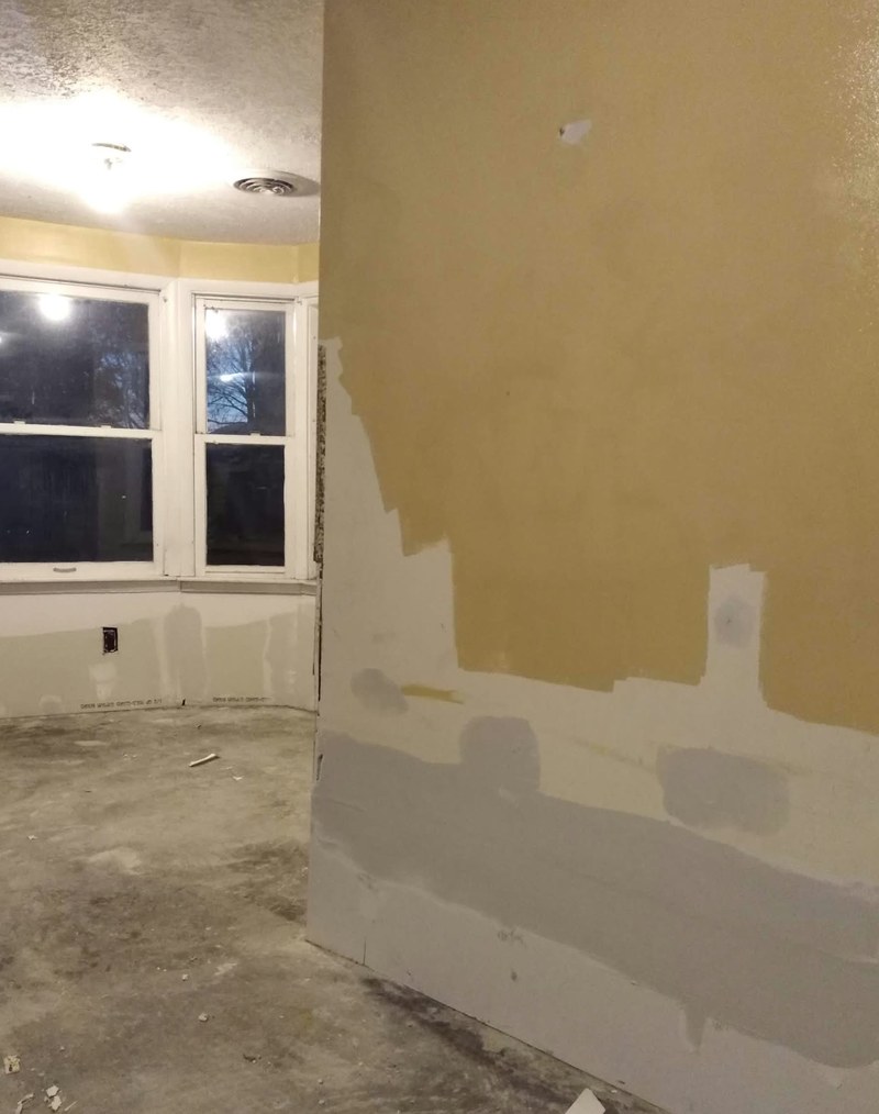 Drywall repair and patching work in progress