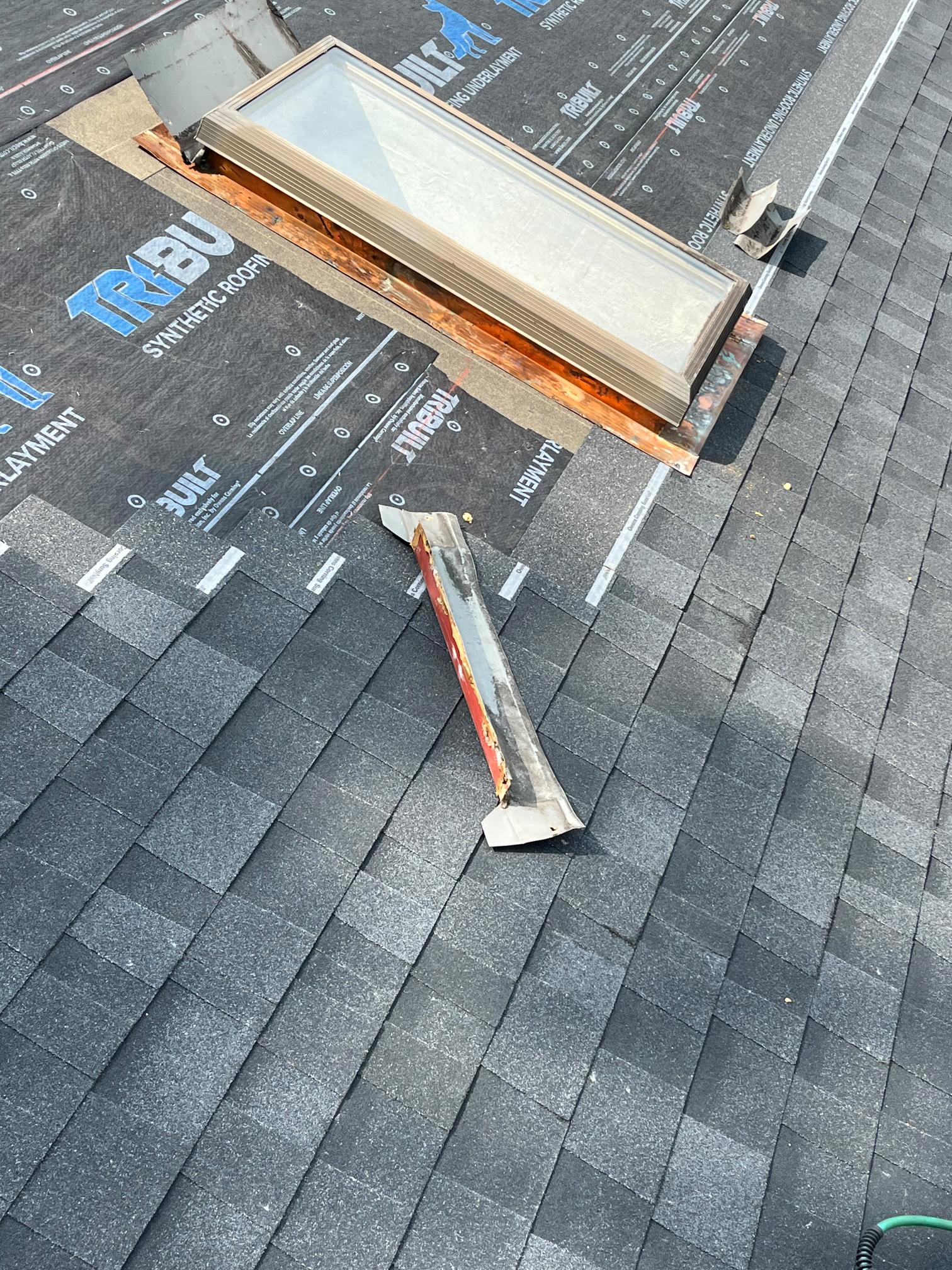 Skylight installation with underlayment and shingles Pittsburgh PA