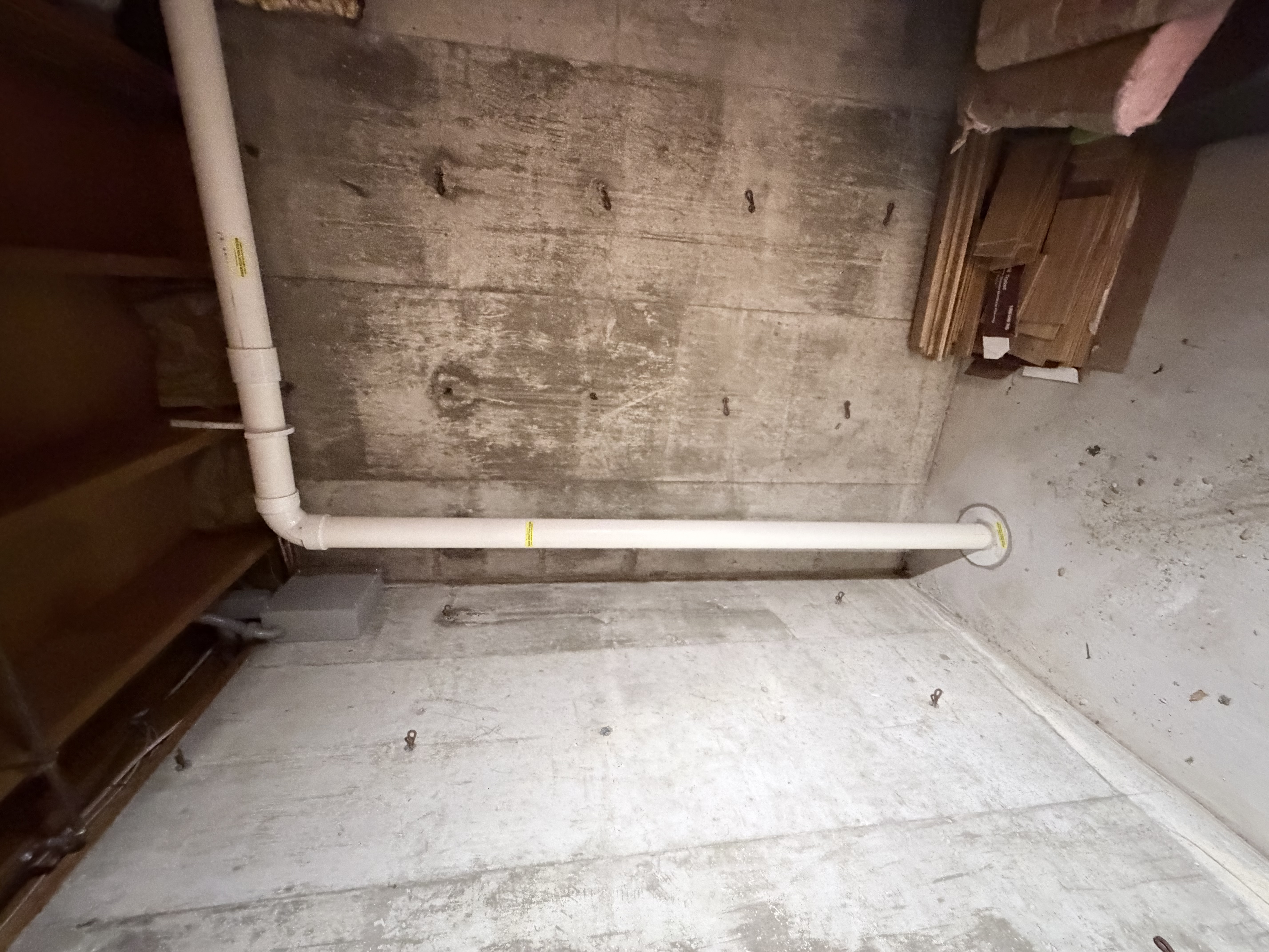 Radon fan and pipe routing — Festa fan installed for sub-slab depressurization