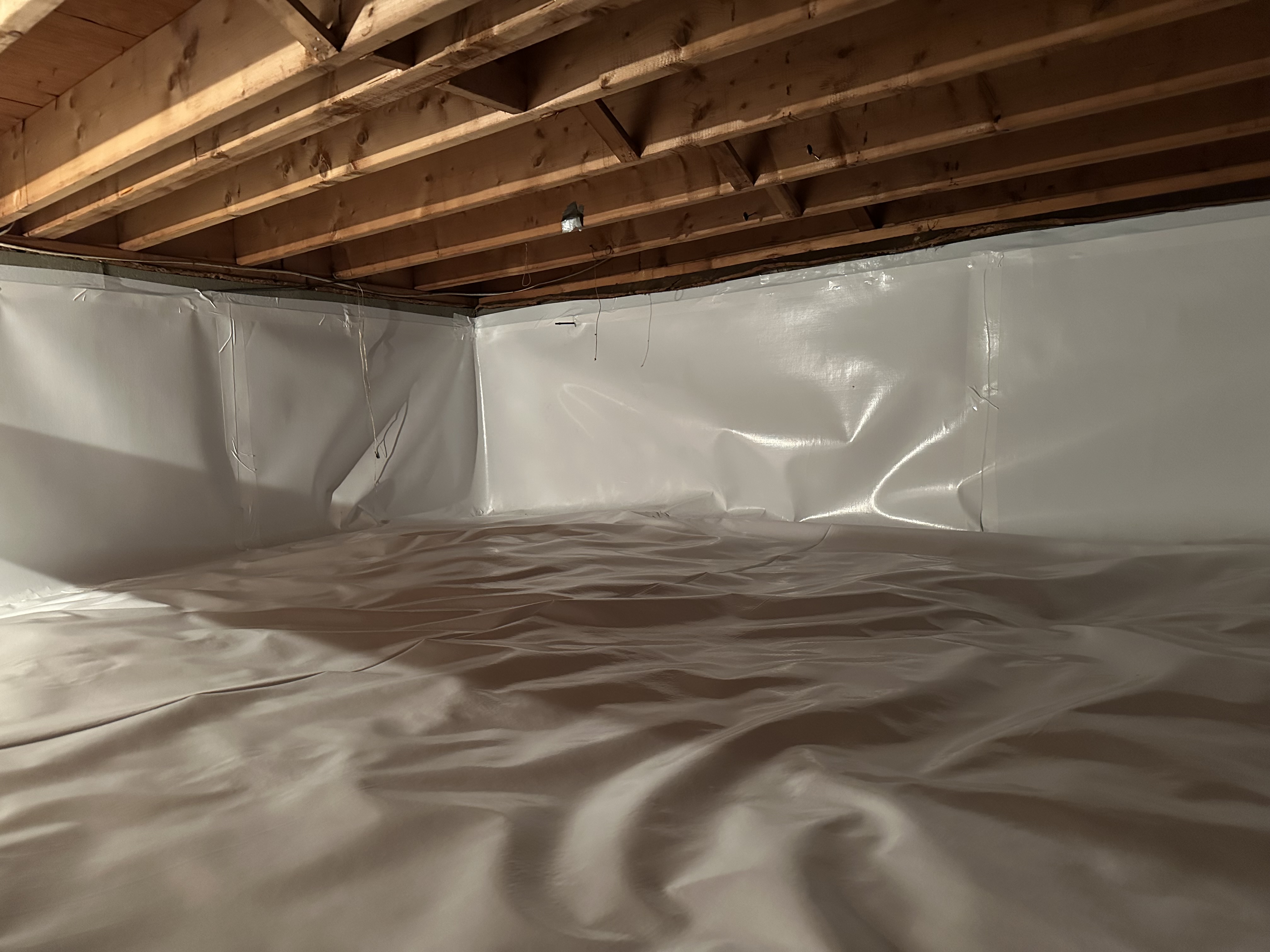 Wide-angle completed crawlspace encapsulation — full perimeter sealed