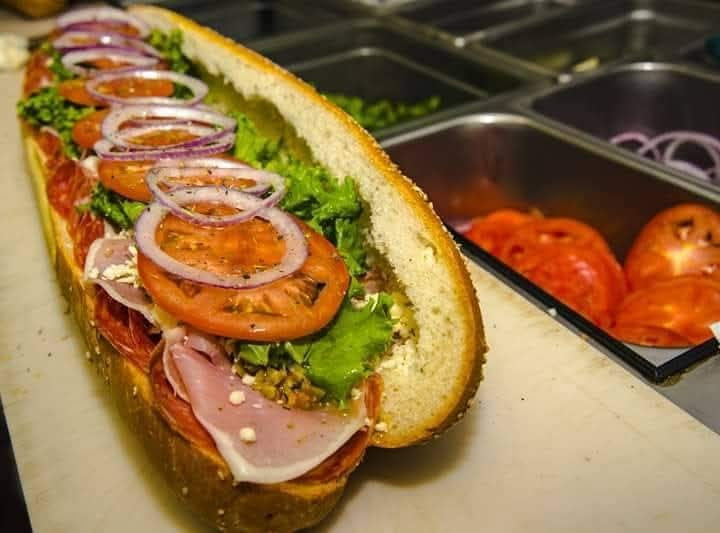 Classic Italian hoagie with tomatoes, onions and lettuce