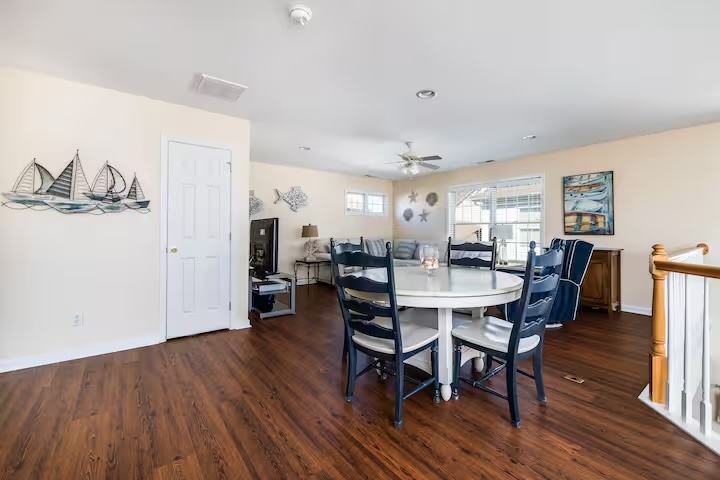 Bayside home dining area with nautical decor