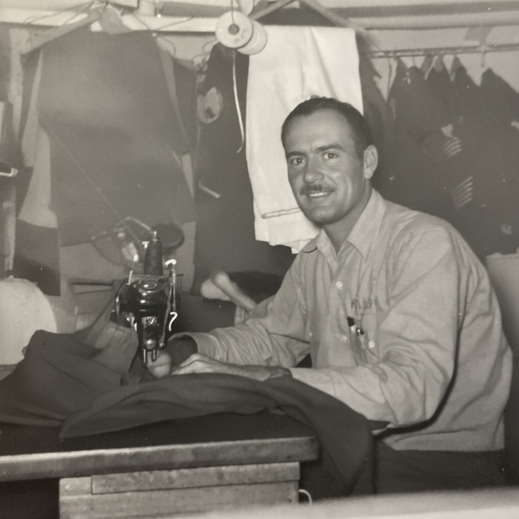 Steve Springer's grandfather — tailor at his sewing machine