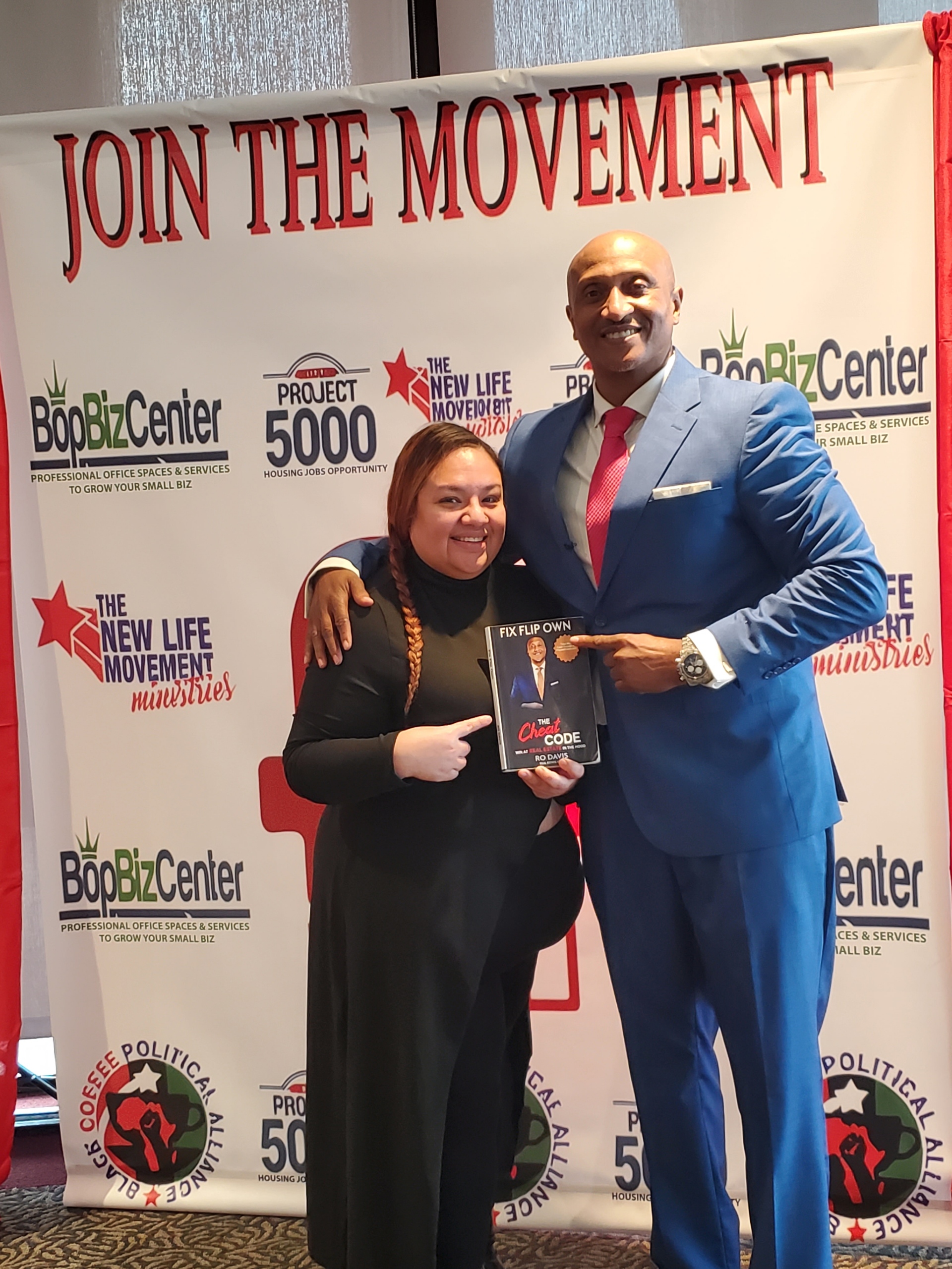 DrRo Davis with student and Fix Flip Own book