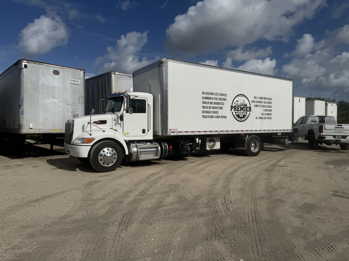 Premier Trailer Repair branded trailer on-site