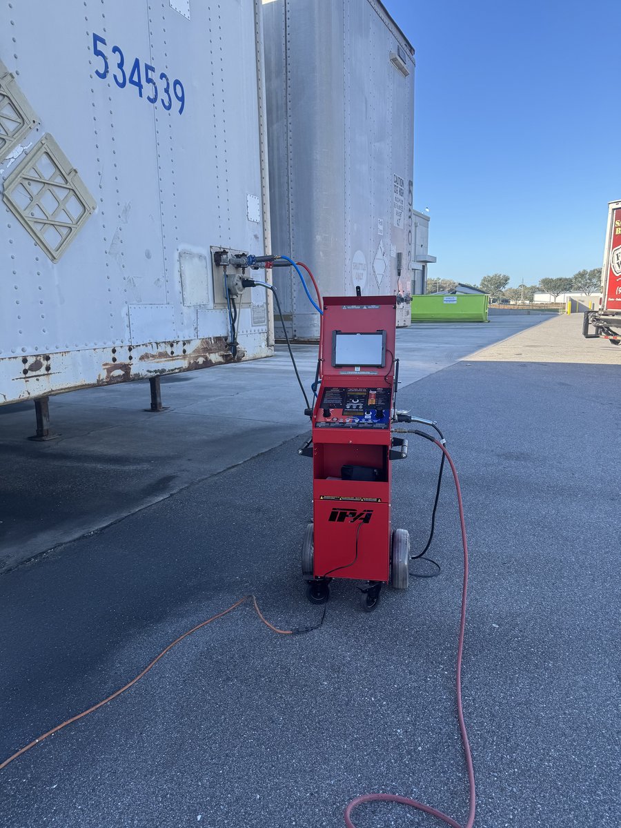 Mobile repair cart equipment on-site at a trailer
