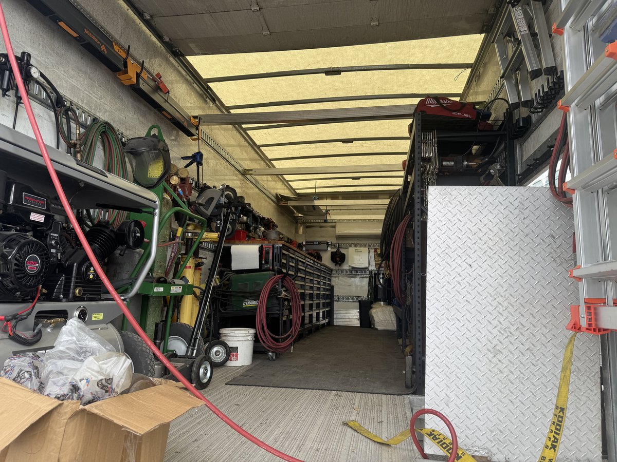 Mobile workshop interior with tools and equipment