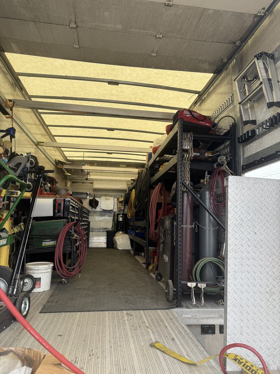 Mobile shop interior with parts and tools