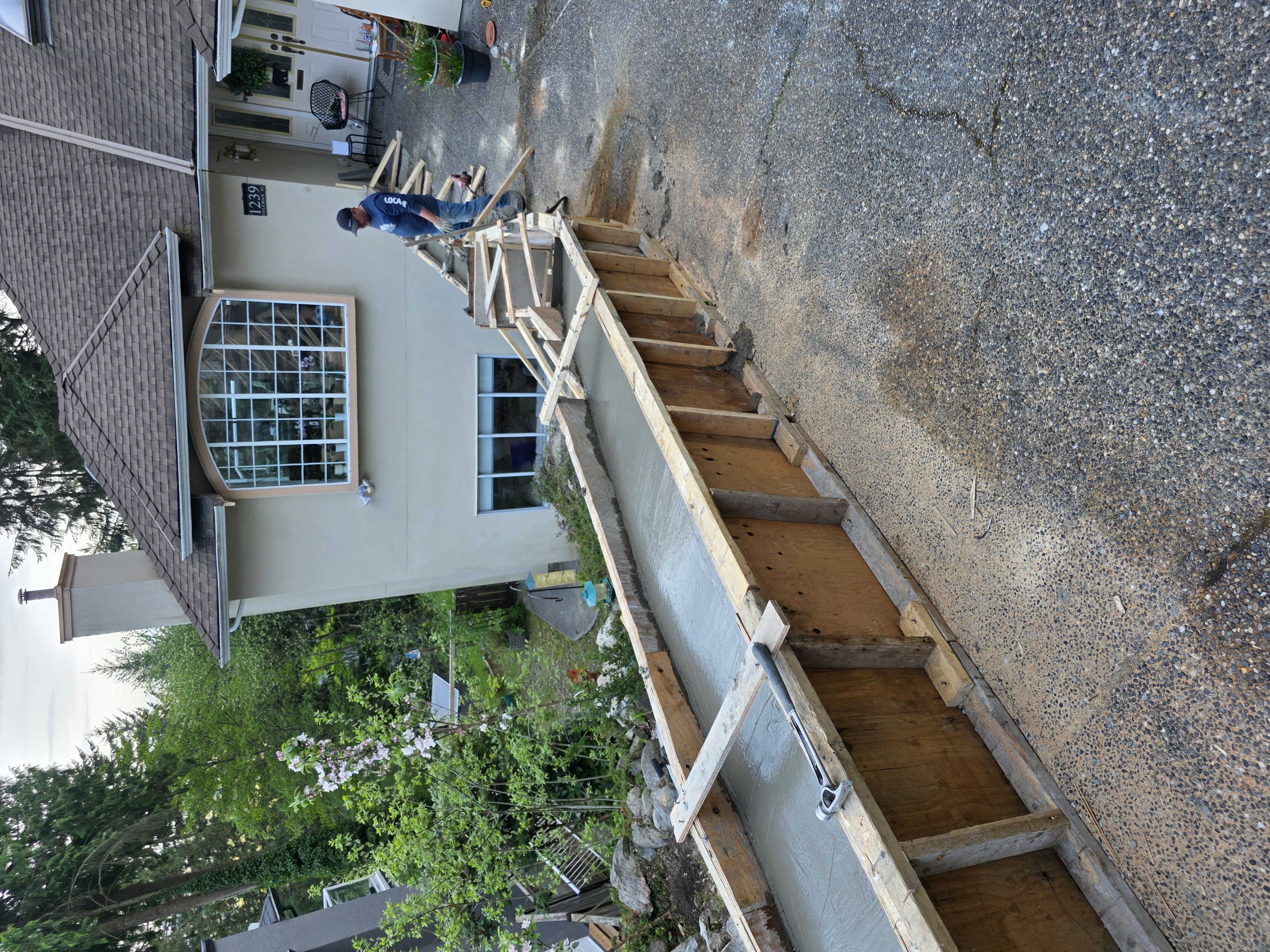 Mohamed's concrete stair forms during the pour by Tarak Construction